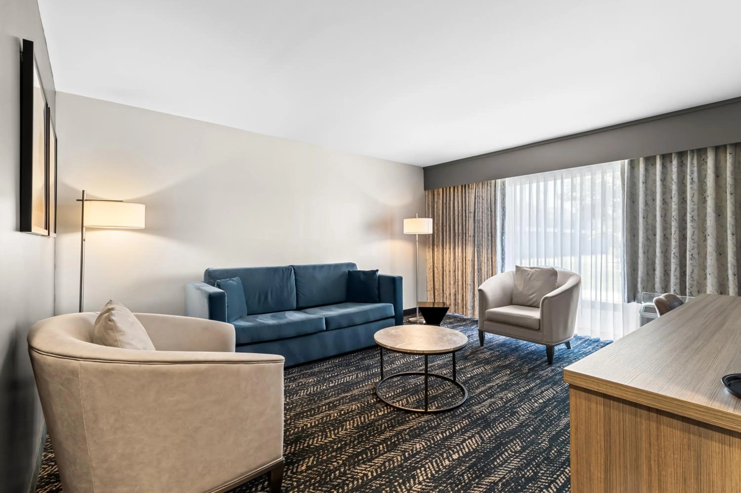 Living room in Hourglass Hotel, Trademark Collection by Wyndham