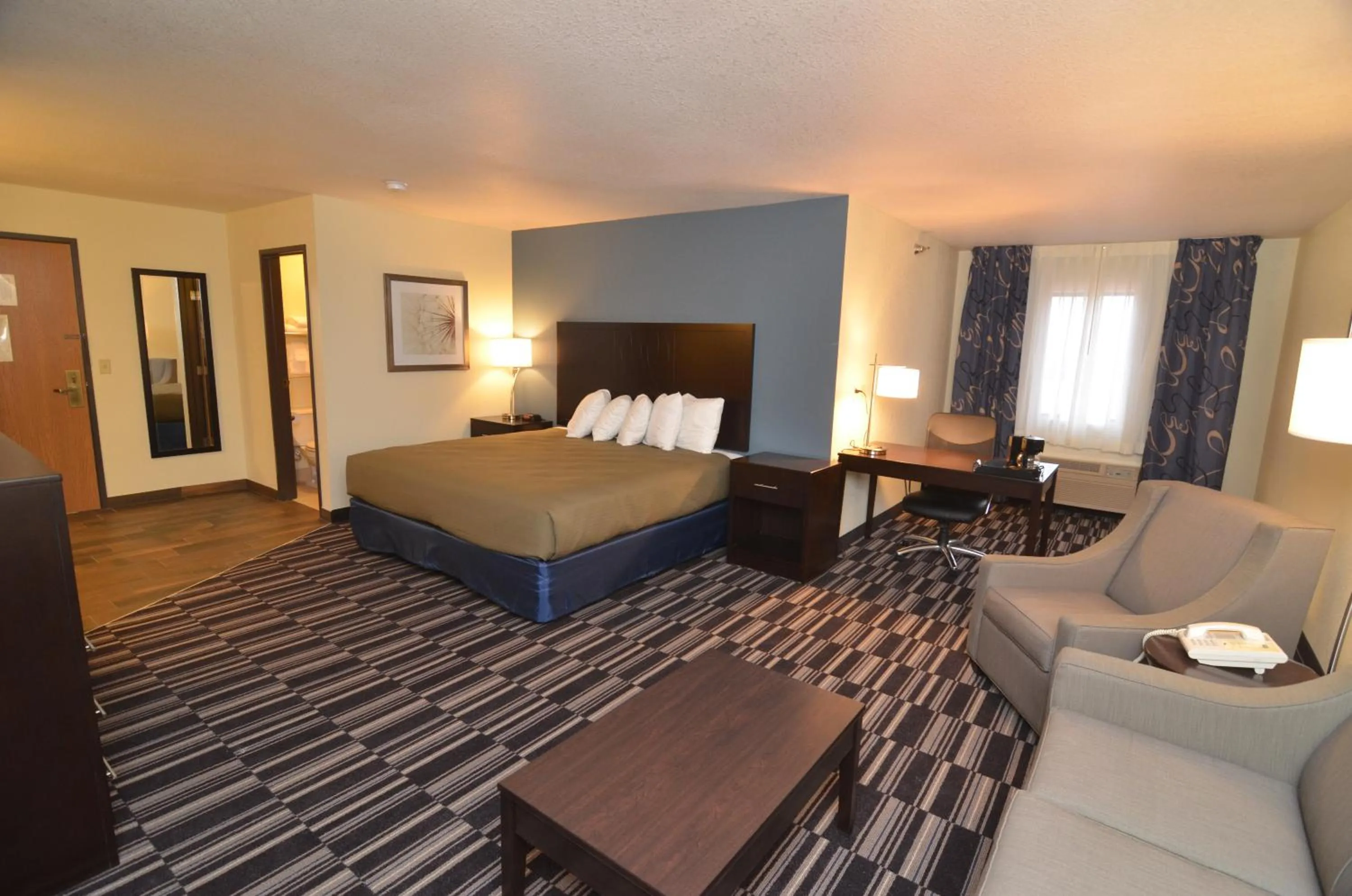 Bedroom, Bed in AmericInn by Wyndham Mount Pleasant