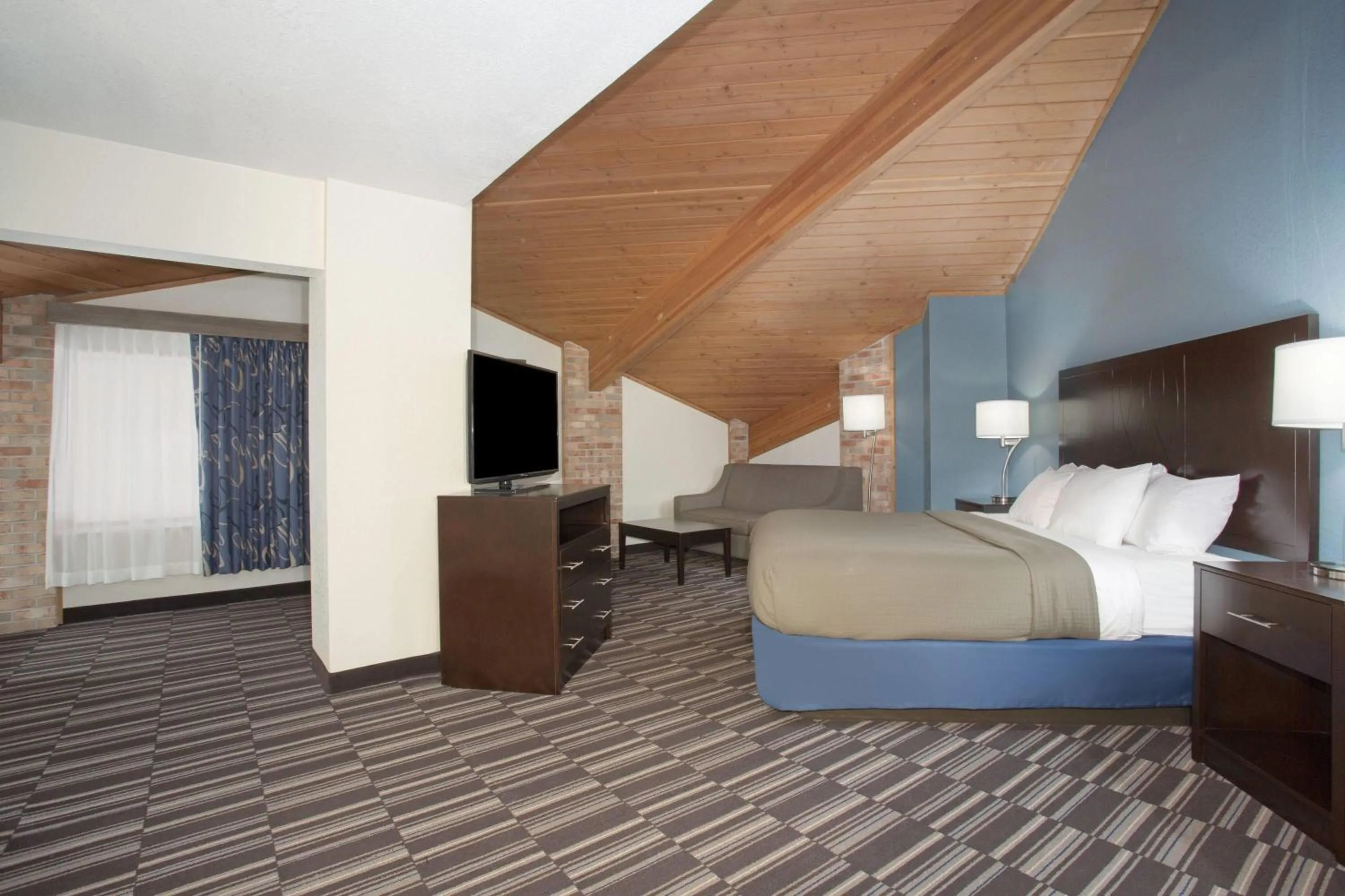 Photo of the whole room, Bed in AmericInn by Wyndham Mount Pleasant