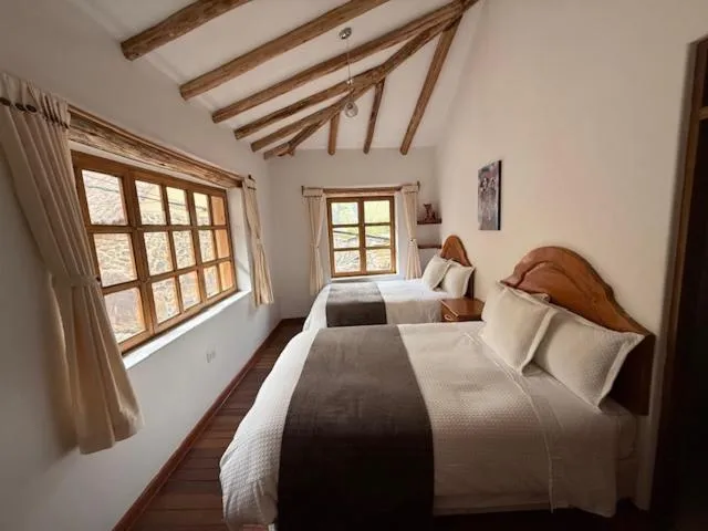 Bed in Parwa Guest House