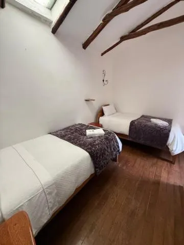 Bed in Parwa Guest House