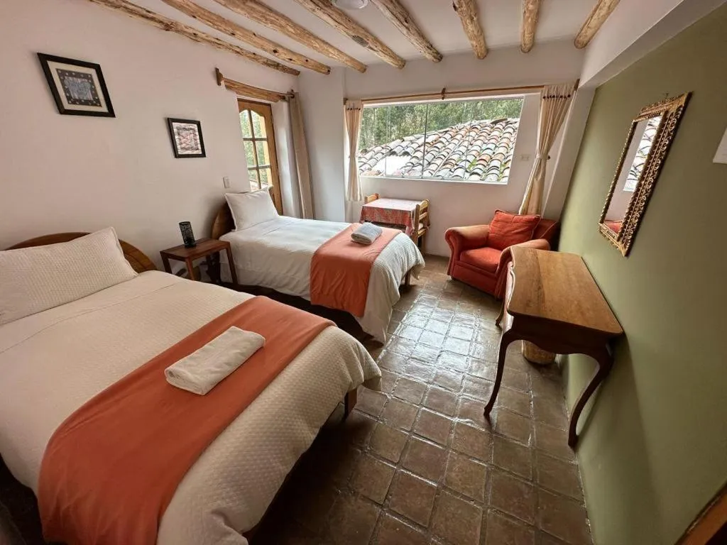 Bed in Parwa Guest House