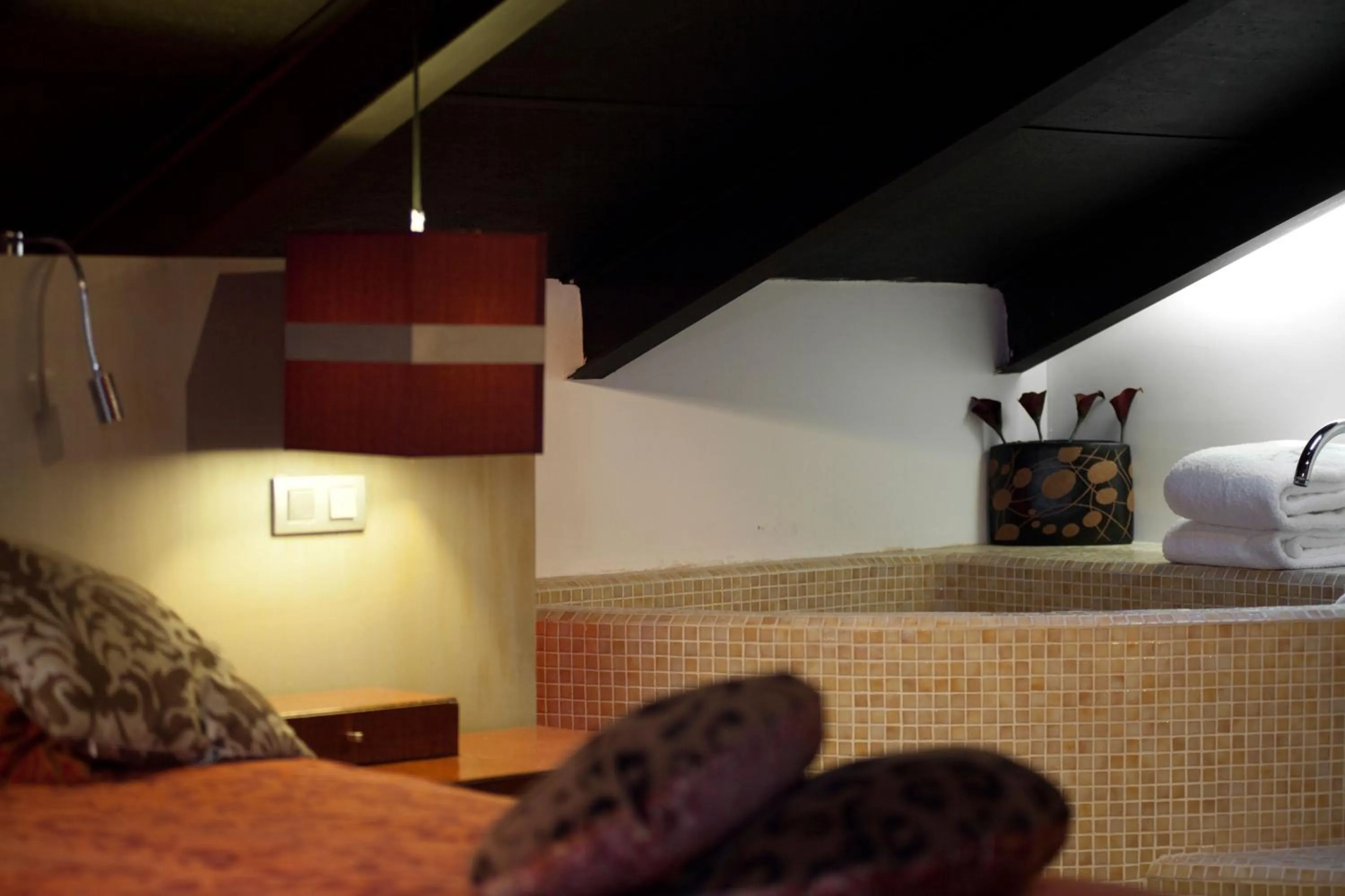 Decorative detail, Bed in Hotel Cardamomo Sigüenza