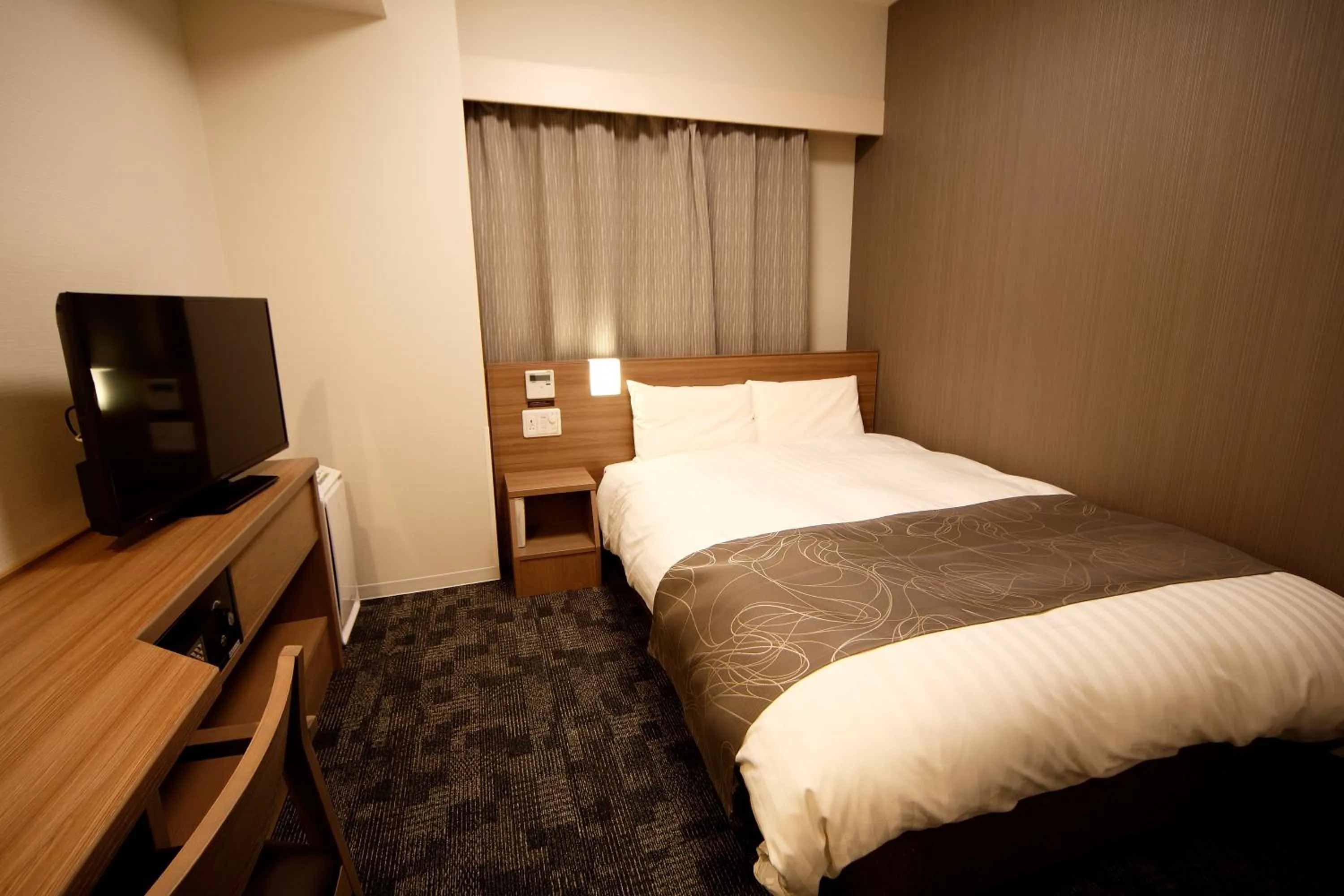 Bed in Dormy Inn Nagano