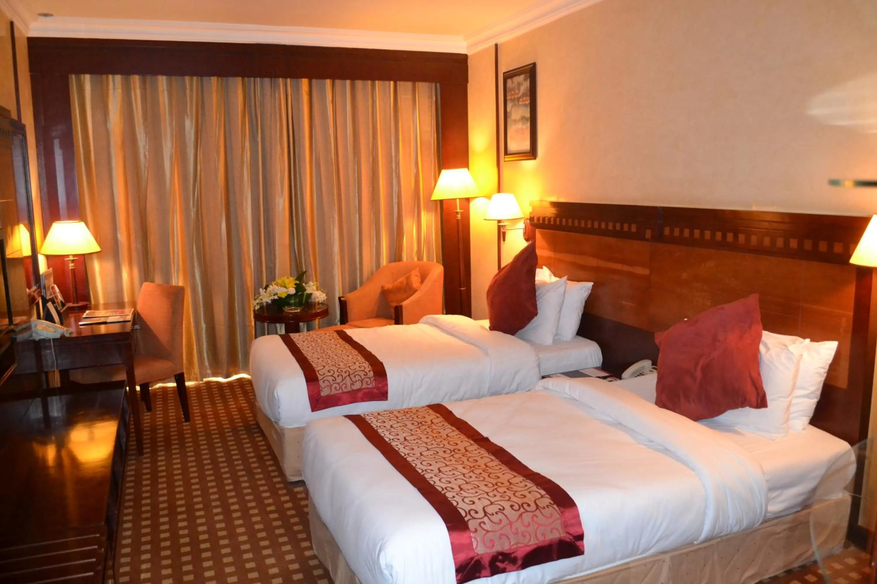 Bed in Ramada Riyadh Hotel