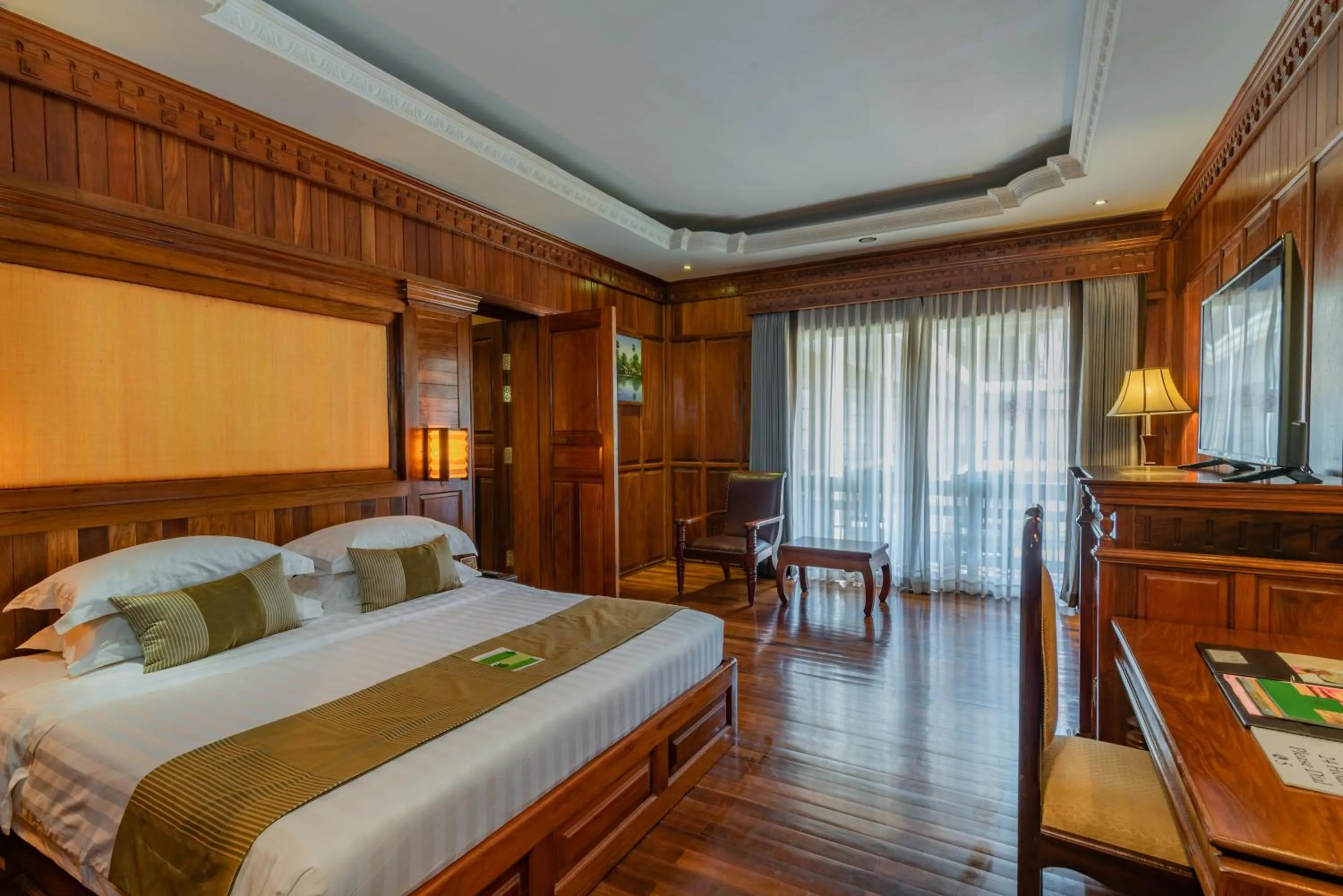Bed in Empress Angkor Resort & Spa
