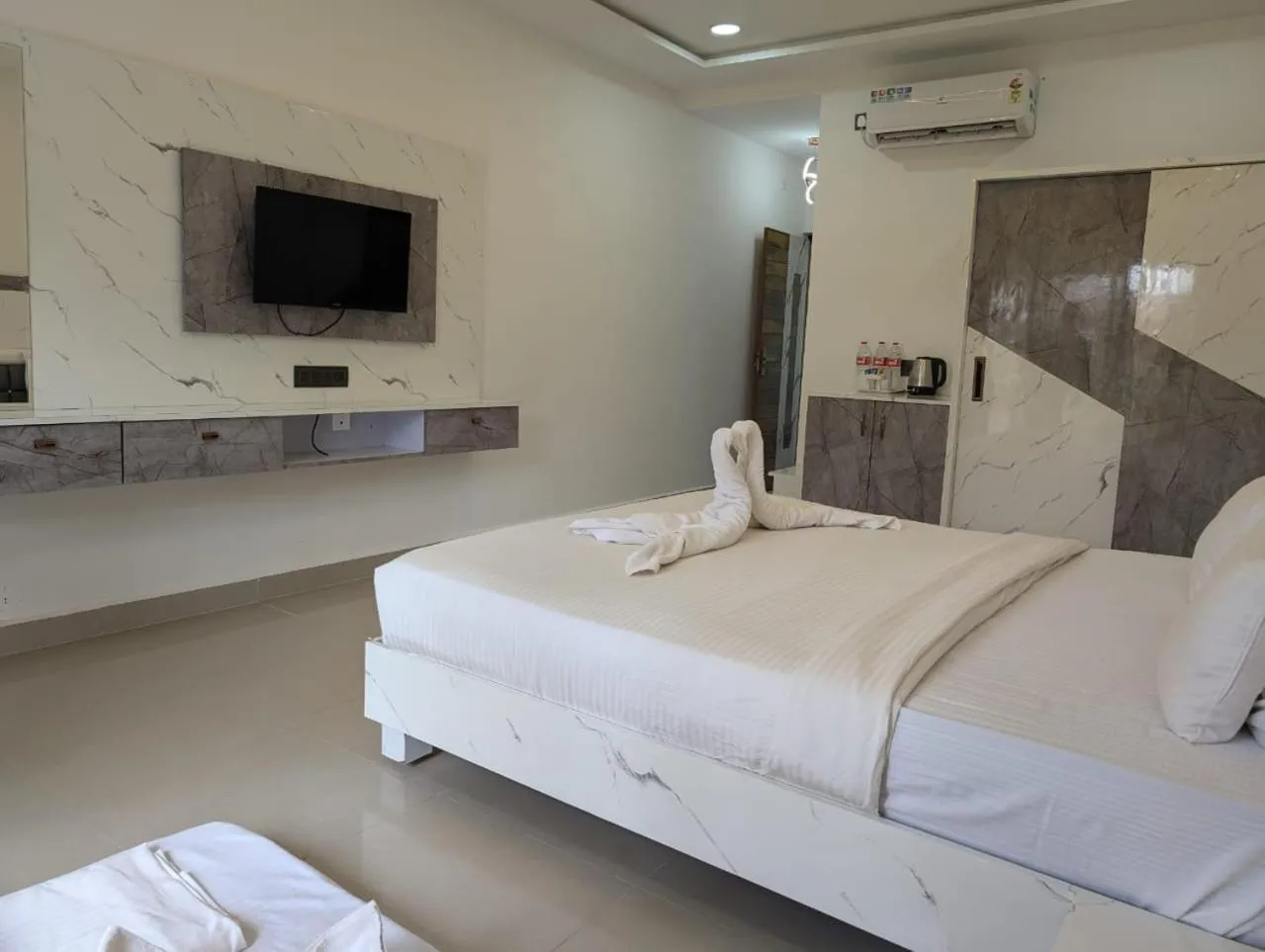 Bed in Shaan Coco Palms Beach Resort