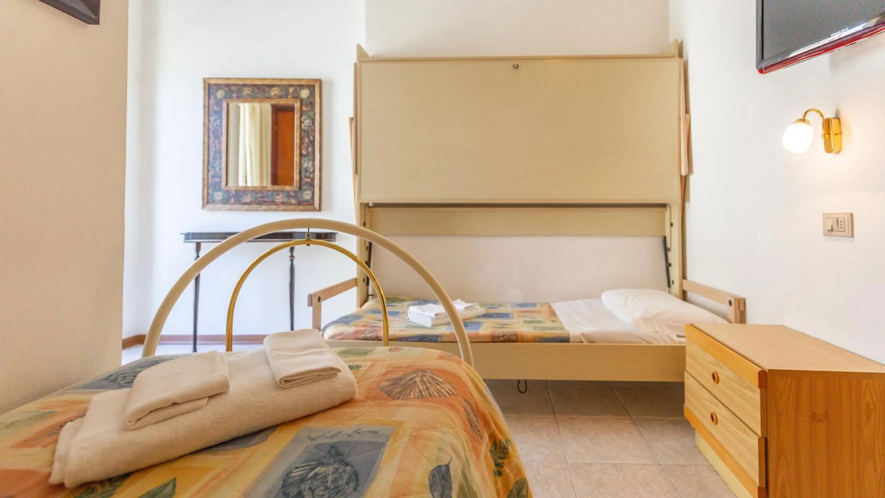 Photo of the whole room, Bed in Hotel Parco Fellini