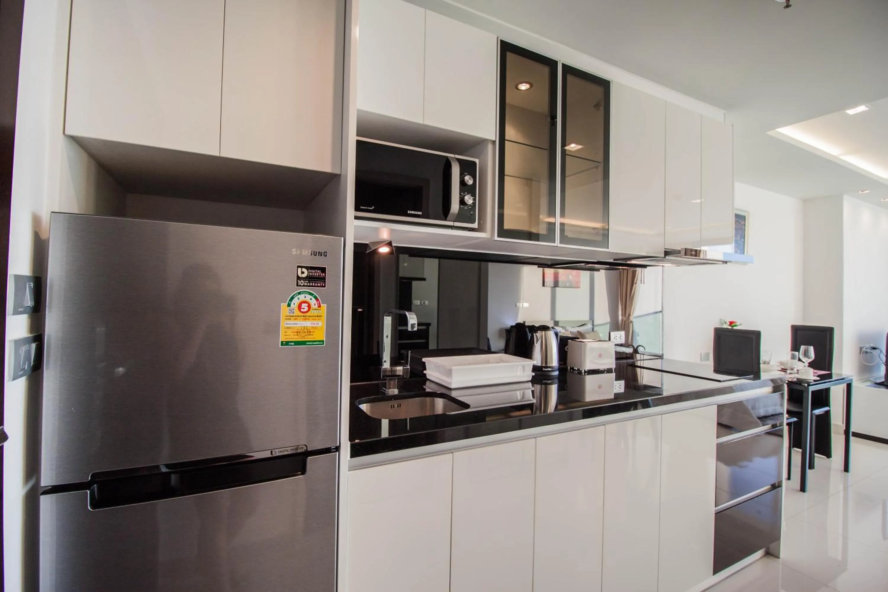 Kitchen or kitchenette in Wongamat Tower by Pattaya Sunny Rentals