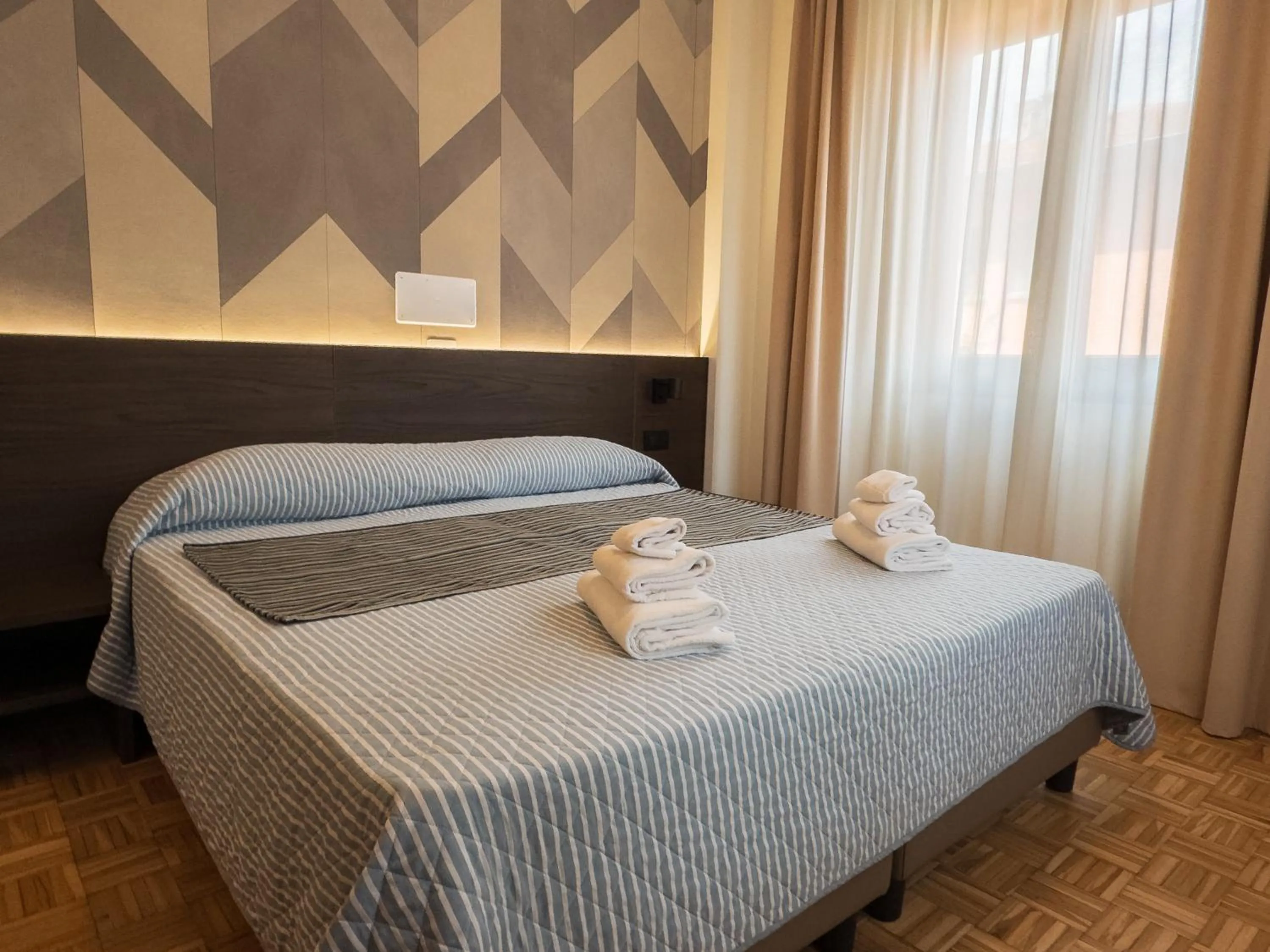 Bed in Hotel Astoria