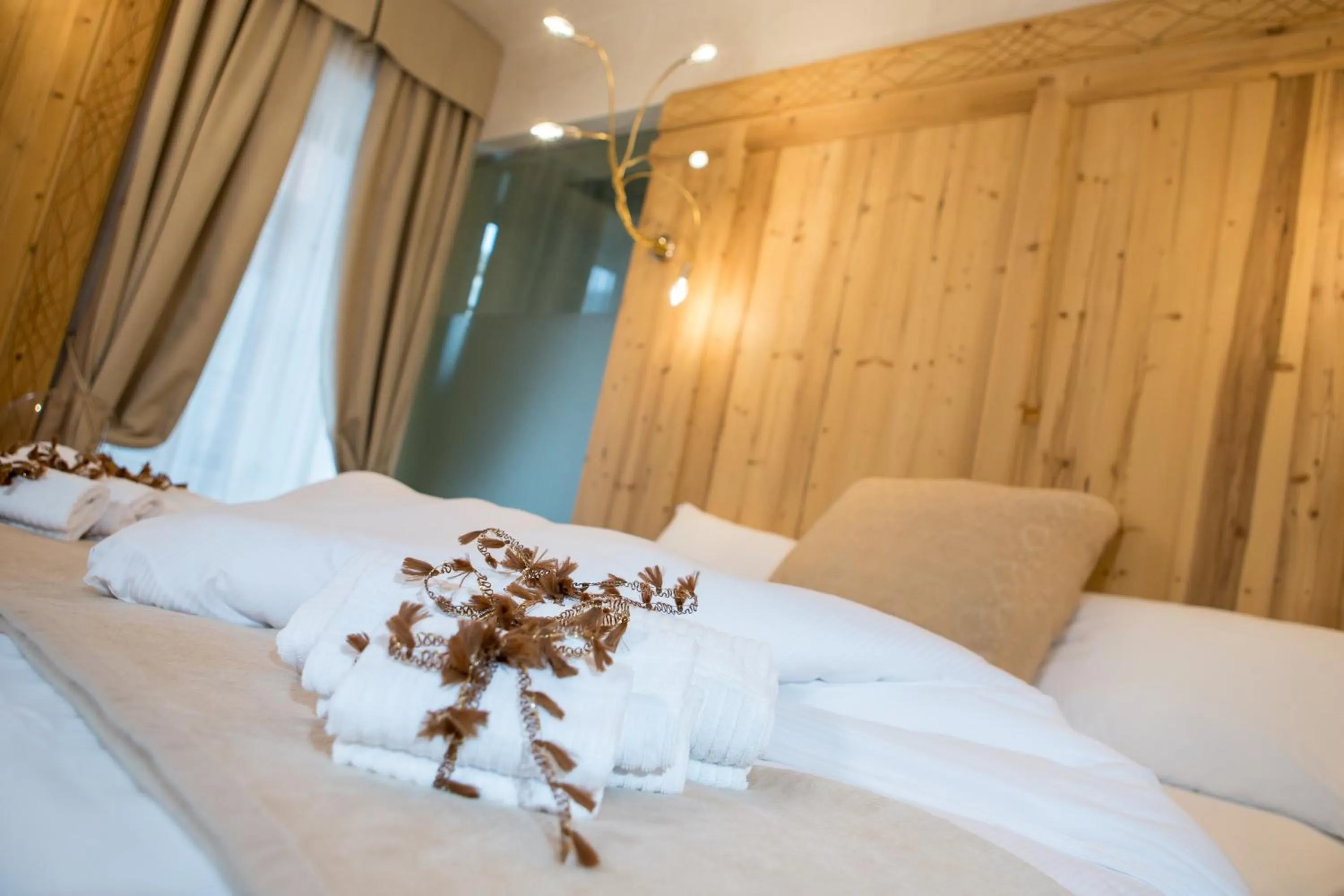 Bed in Hotel Orso Grigio