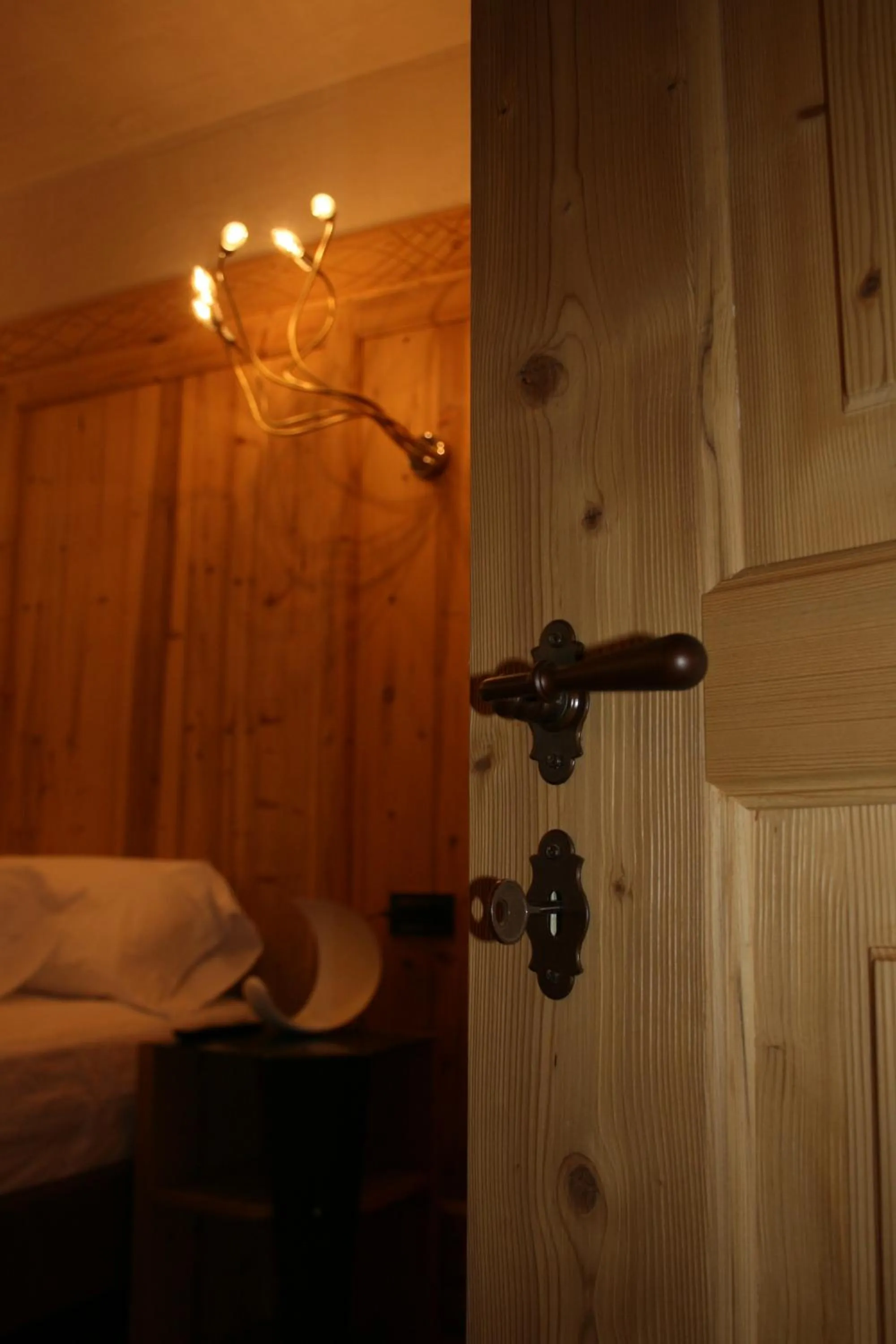 Decorative detail, Bed in Hotel Orso Grigio