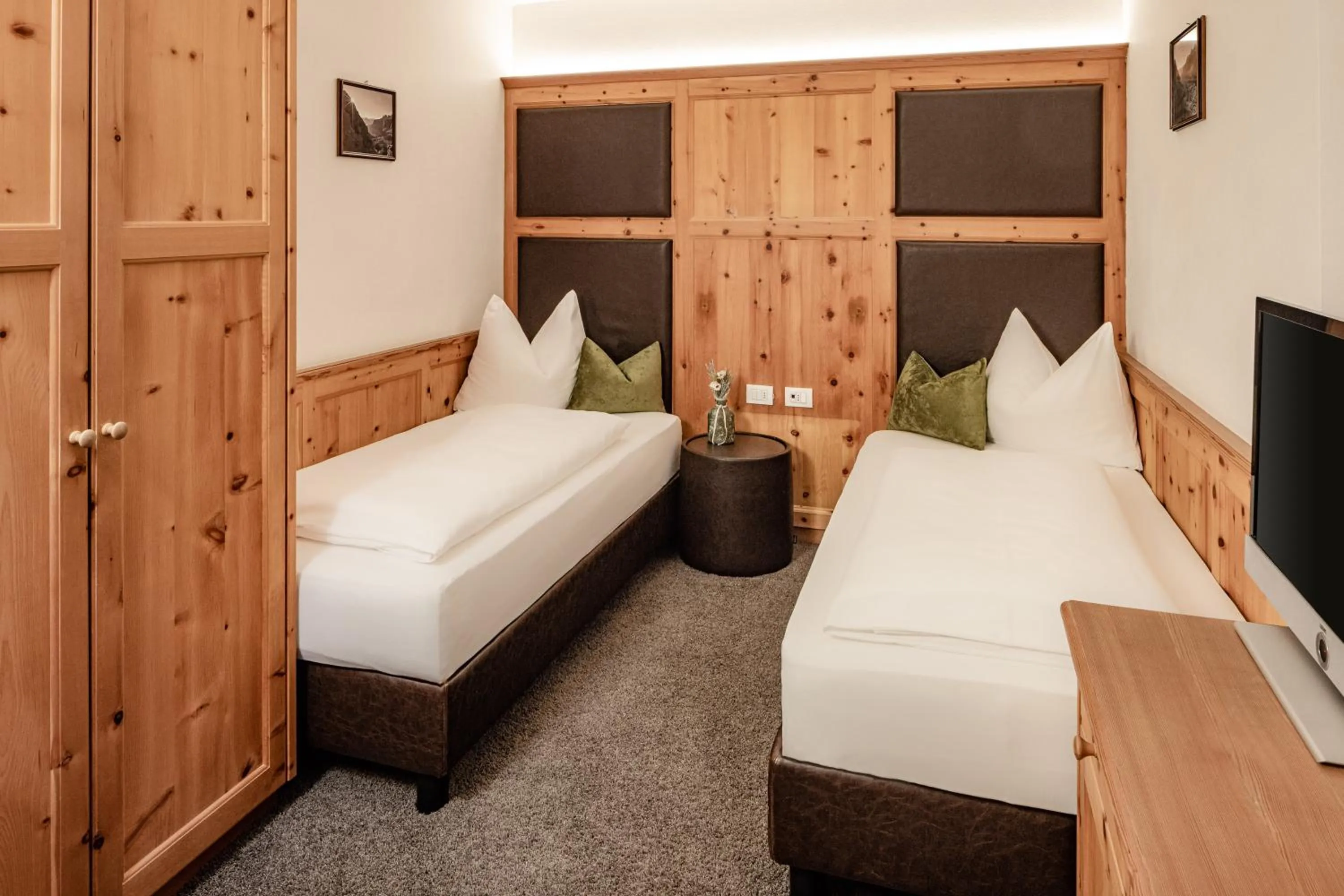 Bed in Boutique & Fashion Hotel Maciaconi - Gardenahotels