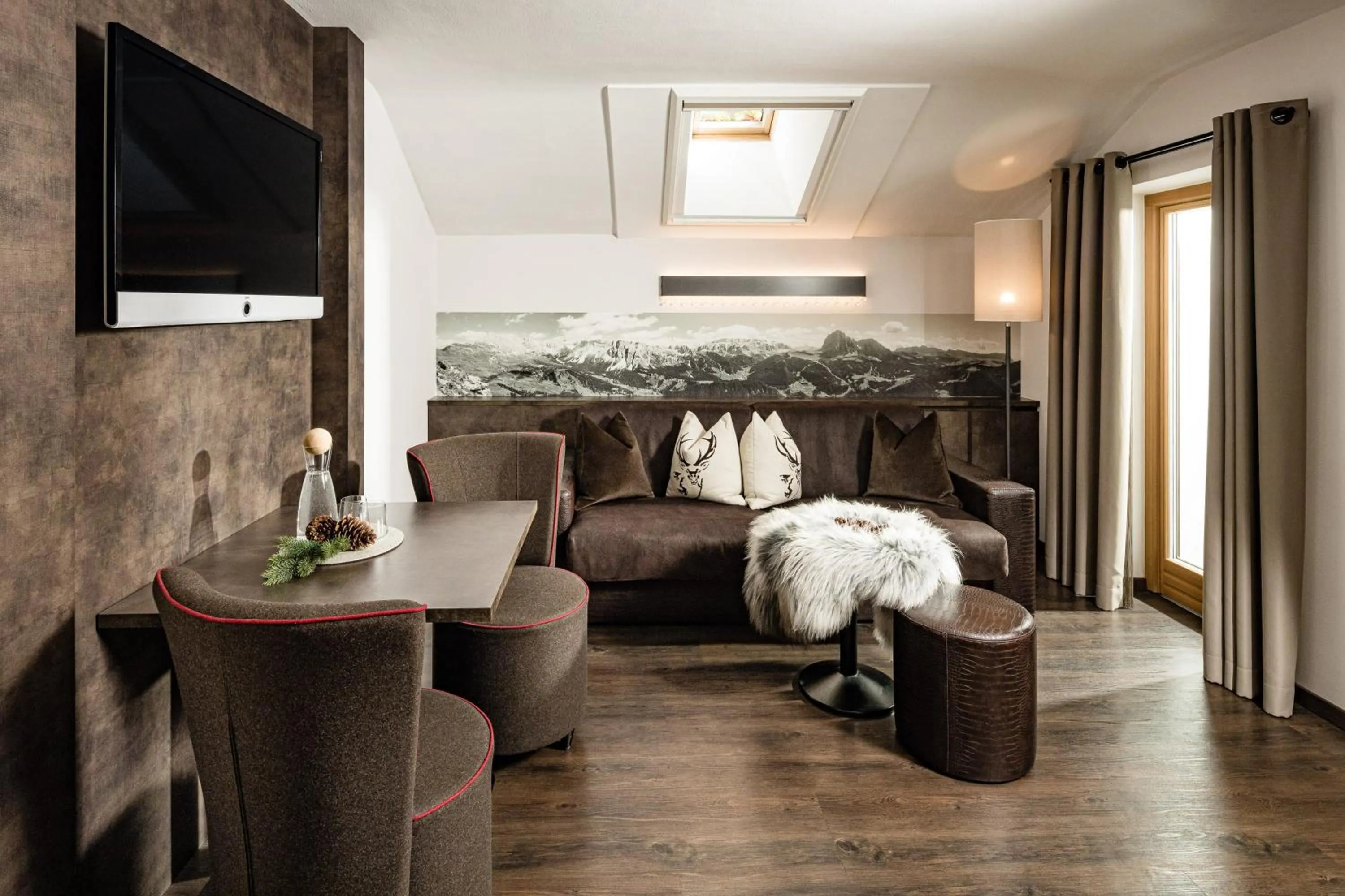 Seating area in Boutique & Fashion Hotel Maciaconi - Gardenahotels