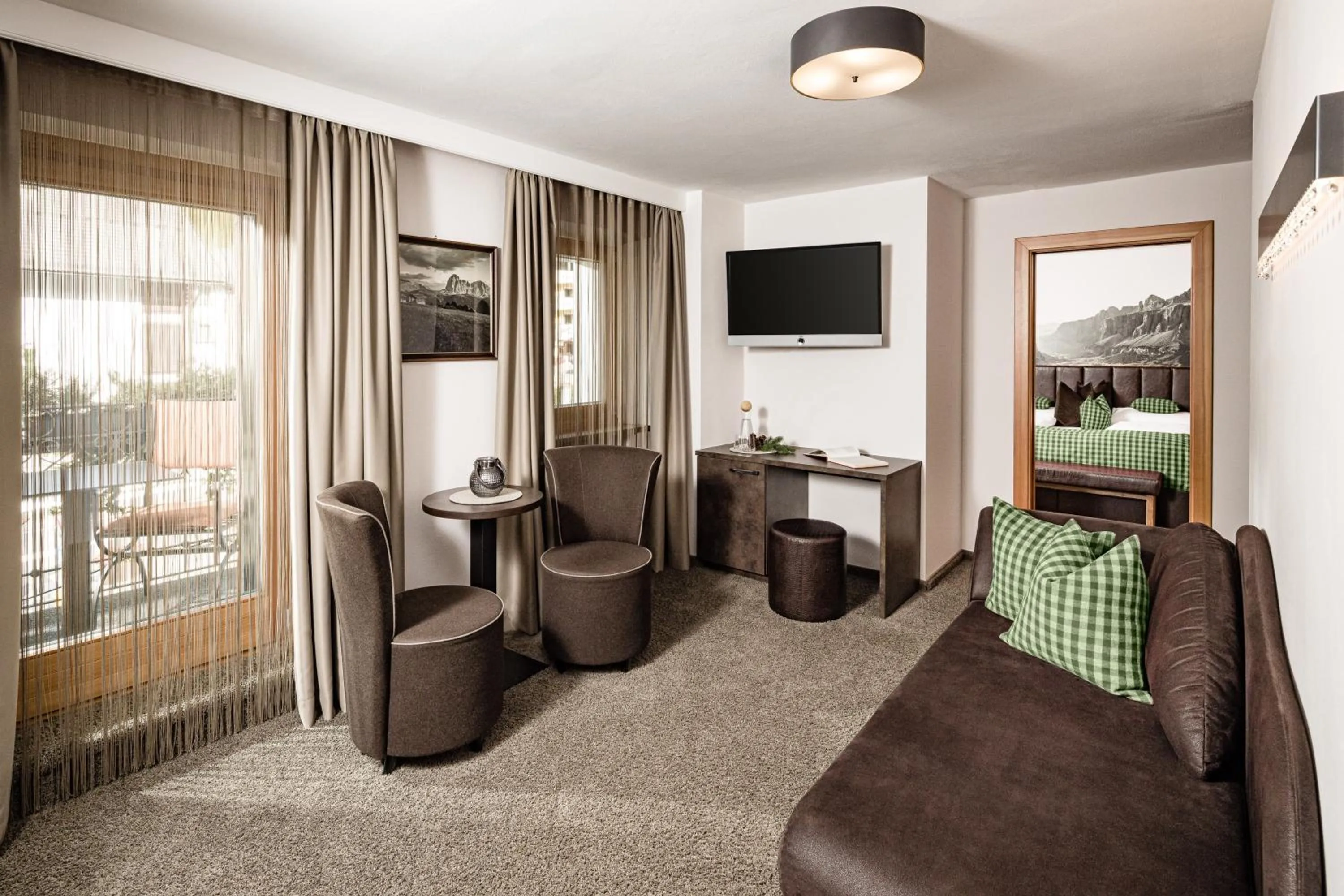 Living room in Boutique & Fashion Hotel Maciaconi - Gardenahotels