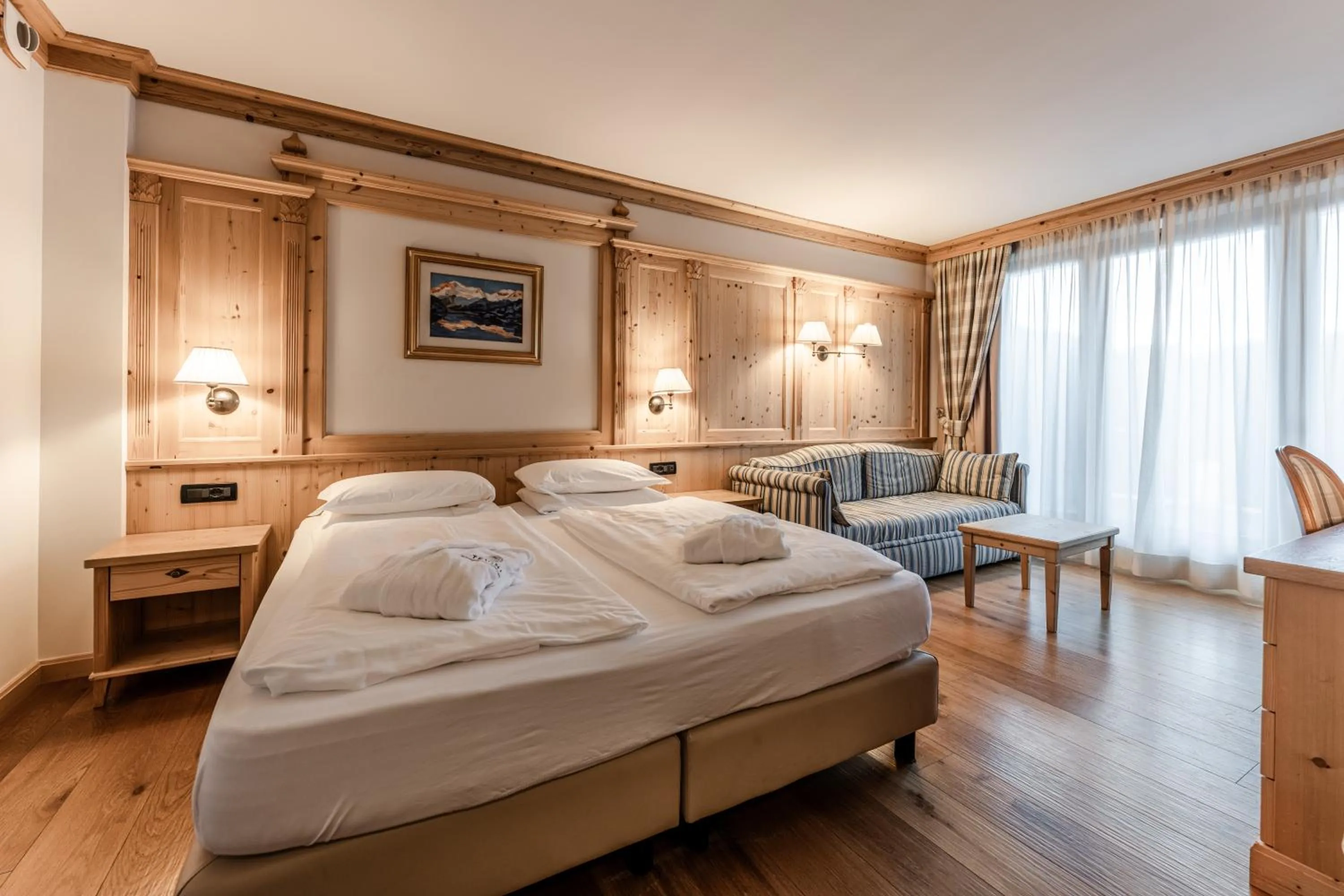 Bed in Tevini Dolomites Charming Hotel