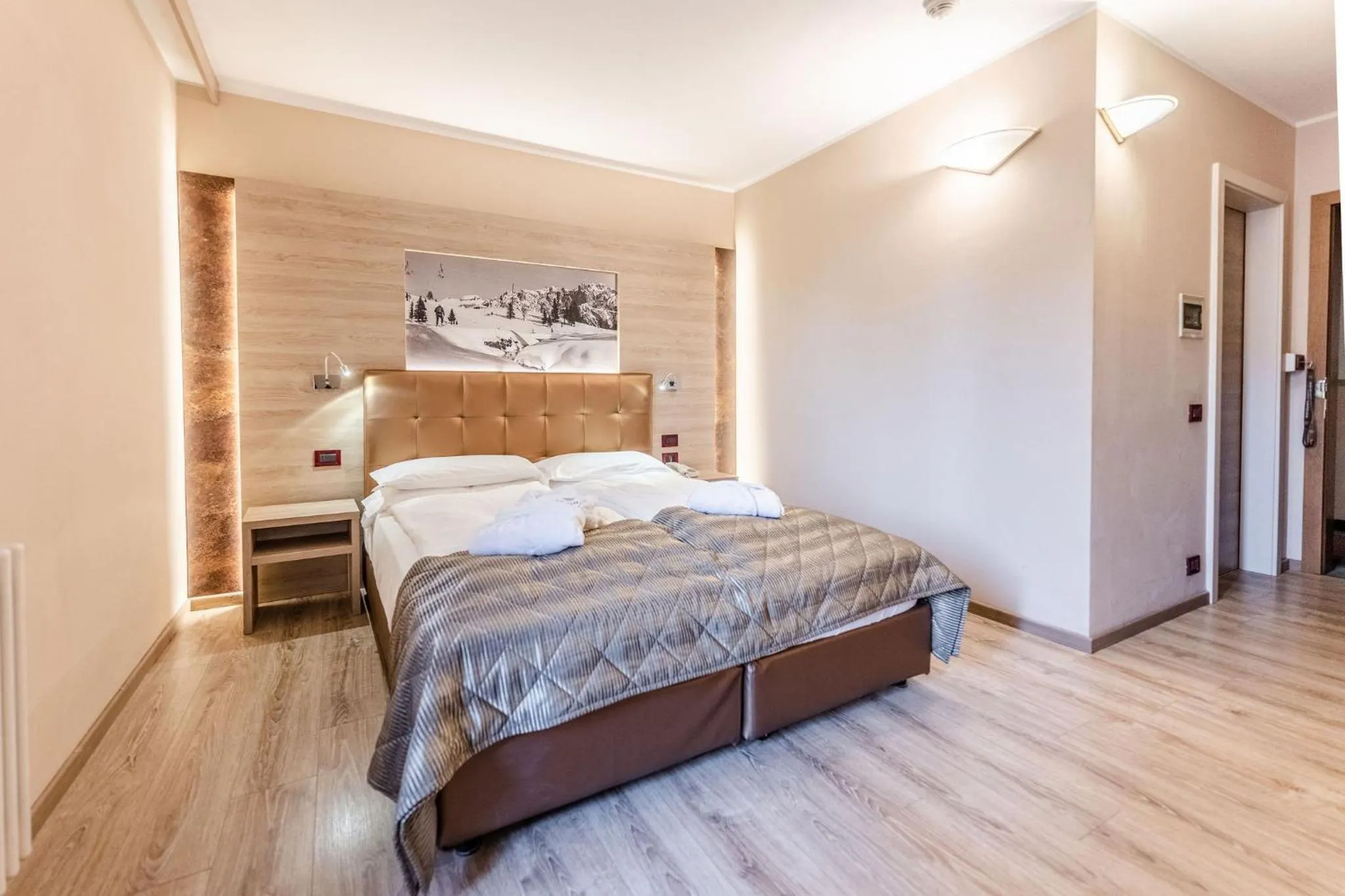 Bed in Tevini Dolomites Charming Hotel