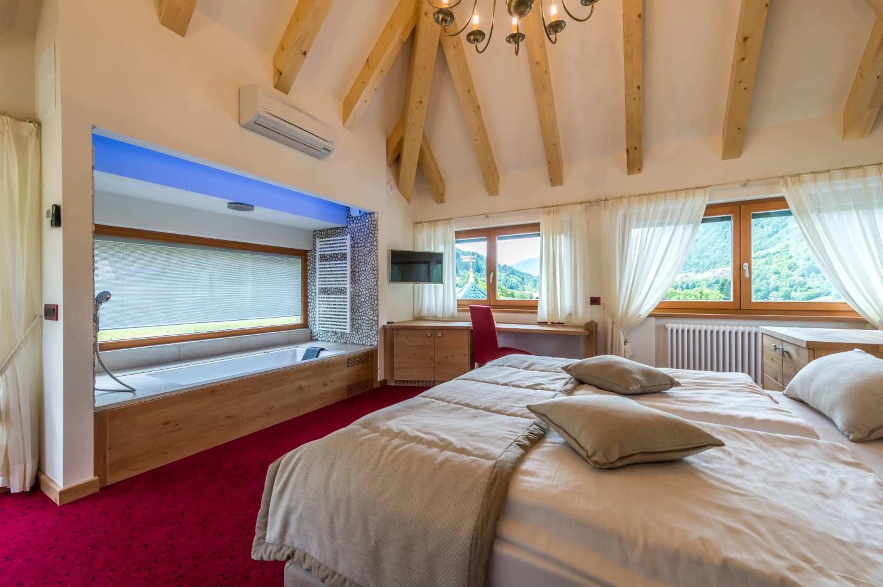 Bedroom, Bed in Tevini Dolomites Charming Hotel
