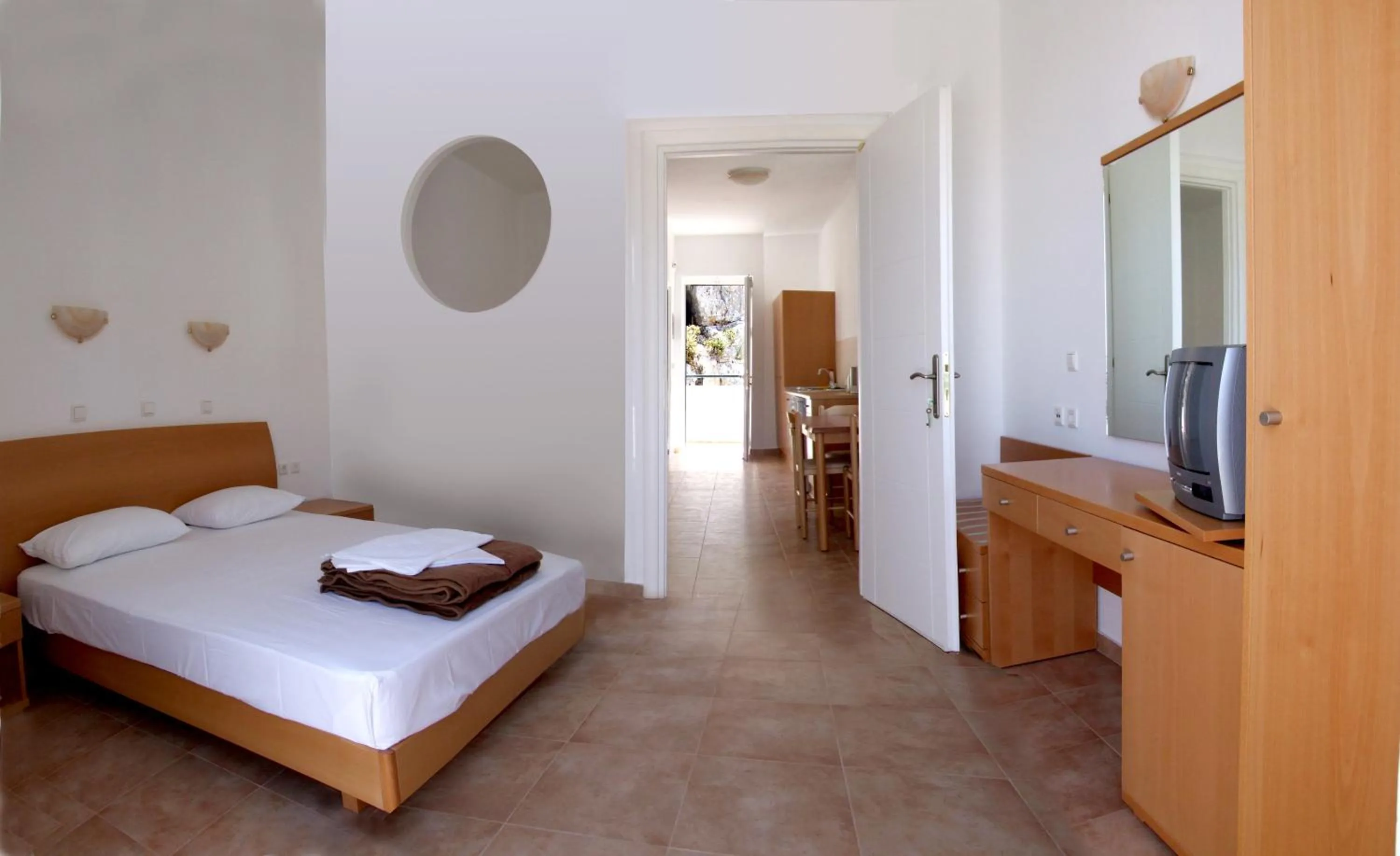 Bed in Lambis Studios & Apartments