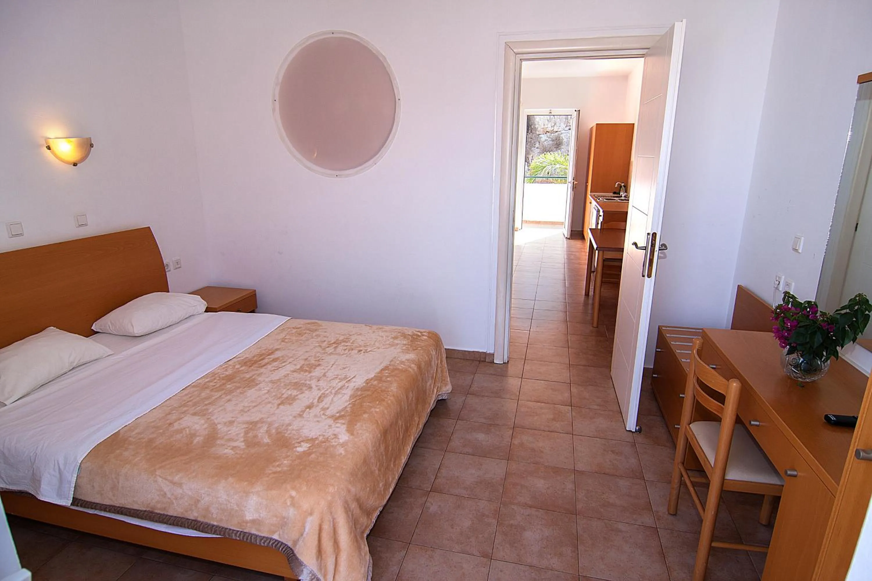 Bed in Lambis Studios & Apartments