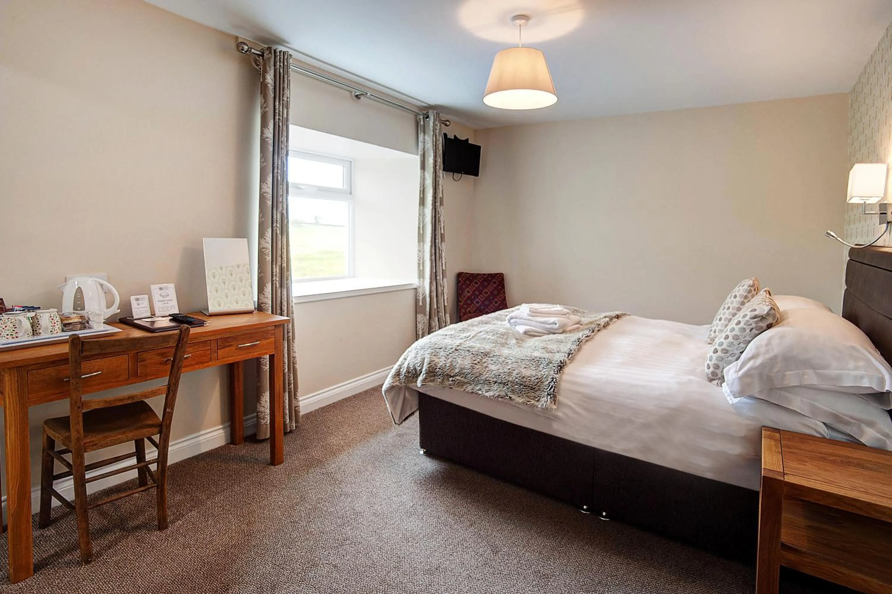 Bed in The Twice Brewed Inn