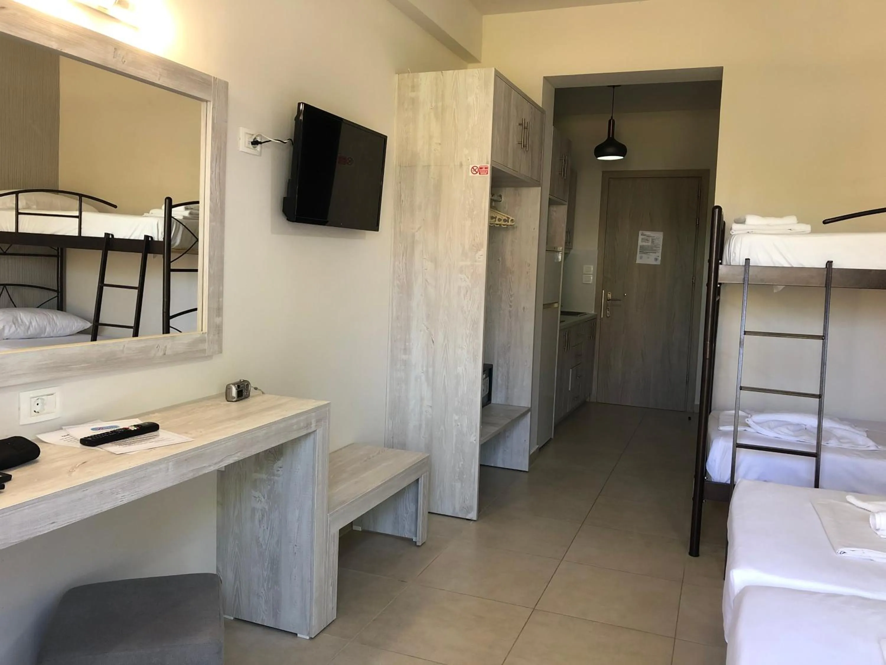 TV and multimedia, Bed in Paradise Apartments