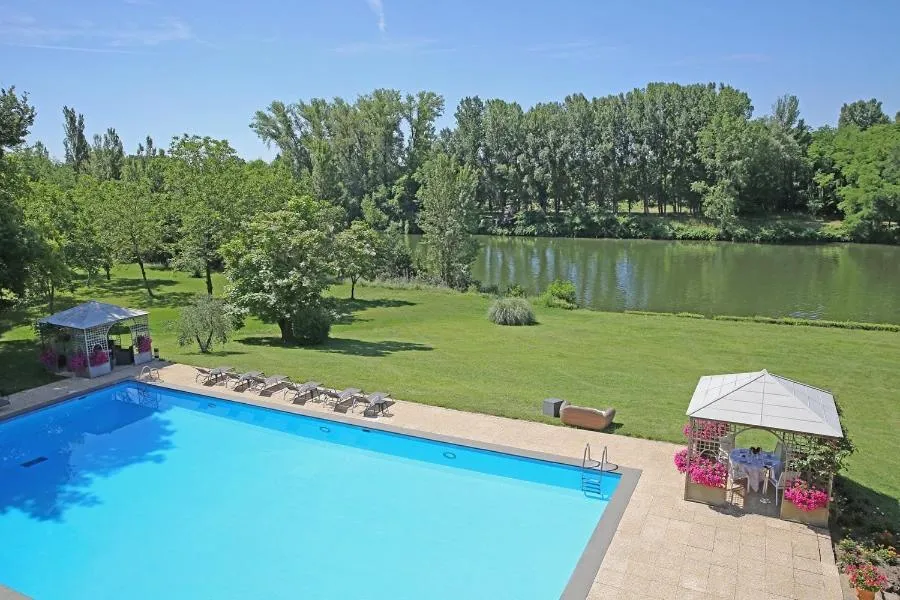 View (from property/room), Pool View in Relais & Châteaux Hôtel La Réserve