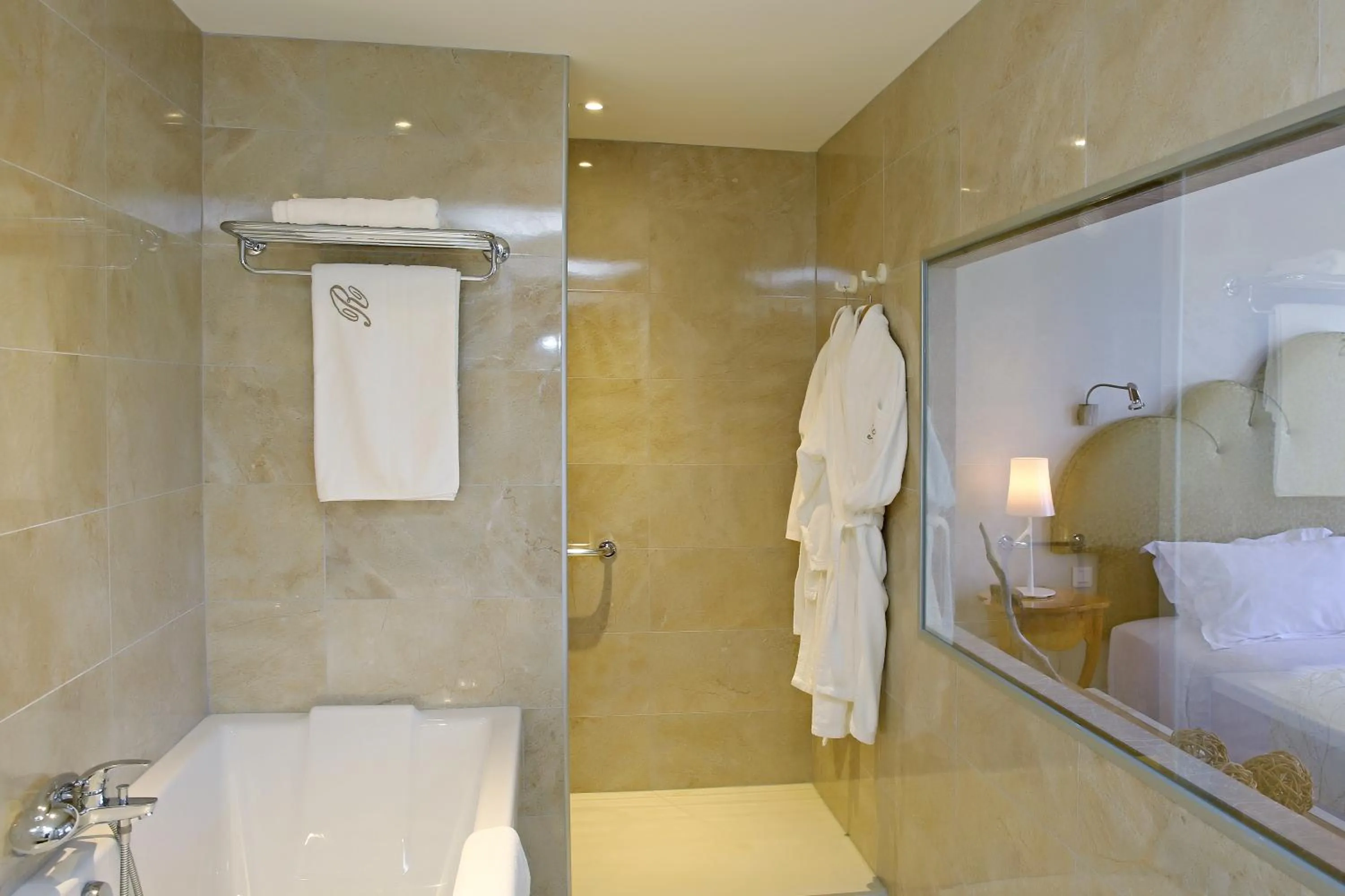 Shower, Bathroom in Relais & Châteaux Hôtel La Réserve