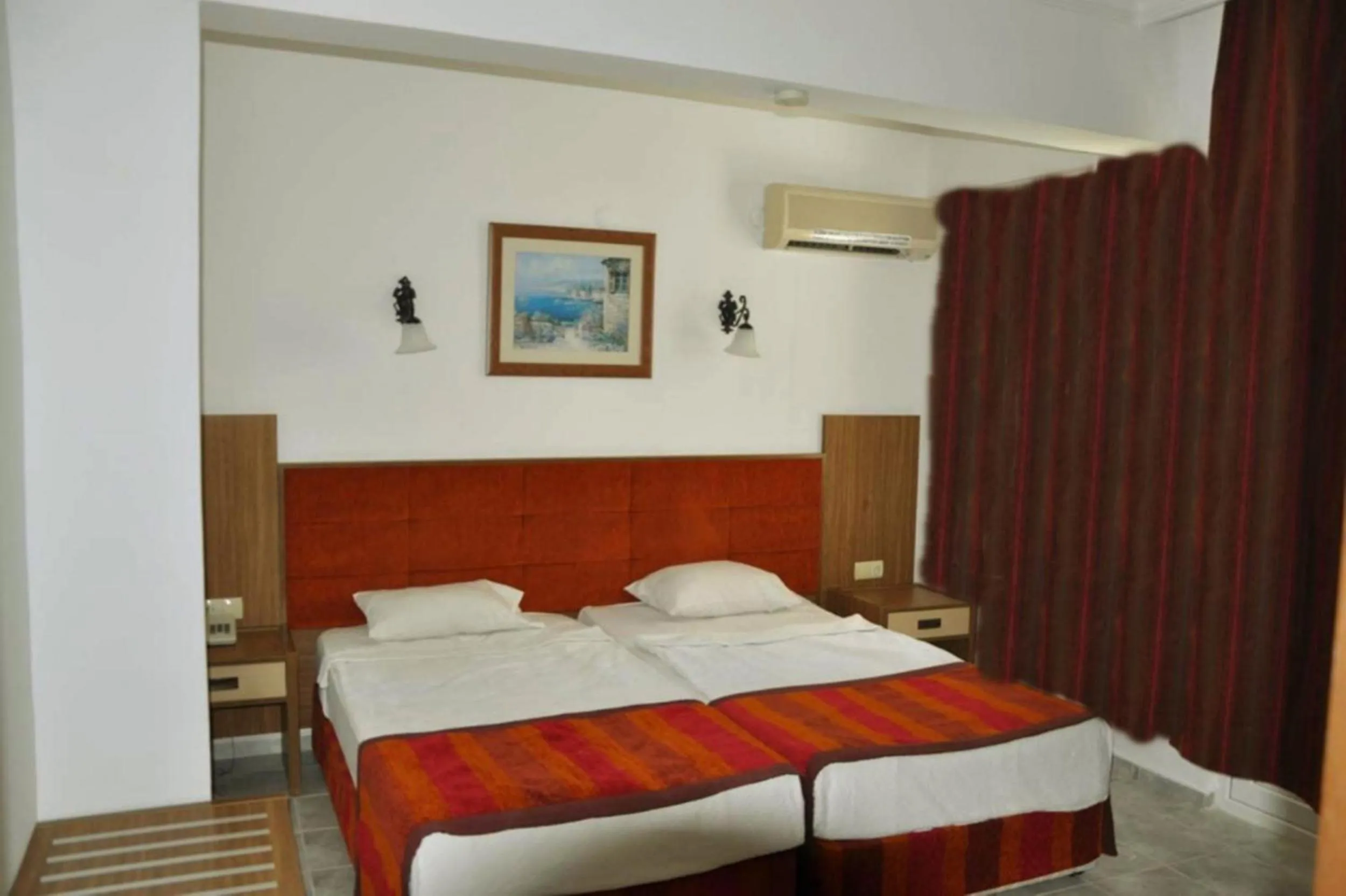 Bedroom, Bed in Carmen Suite Hotel