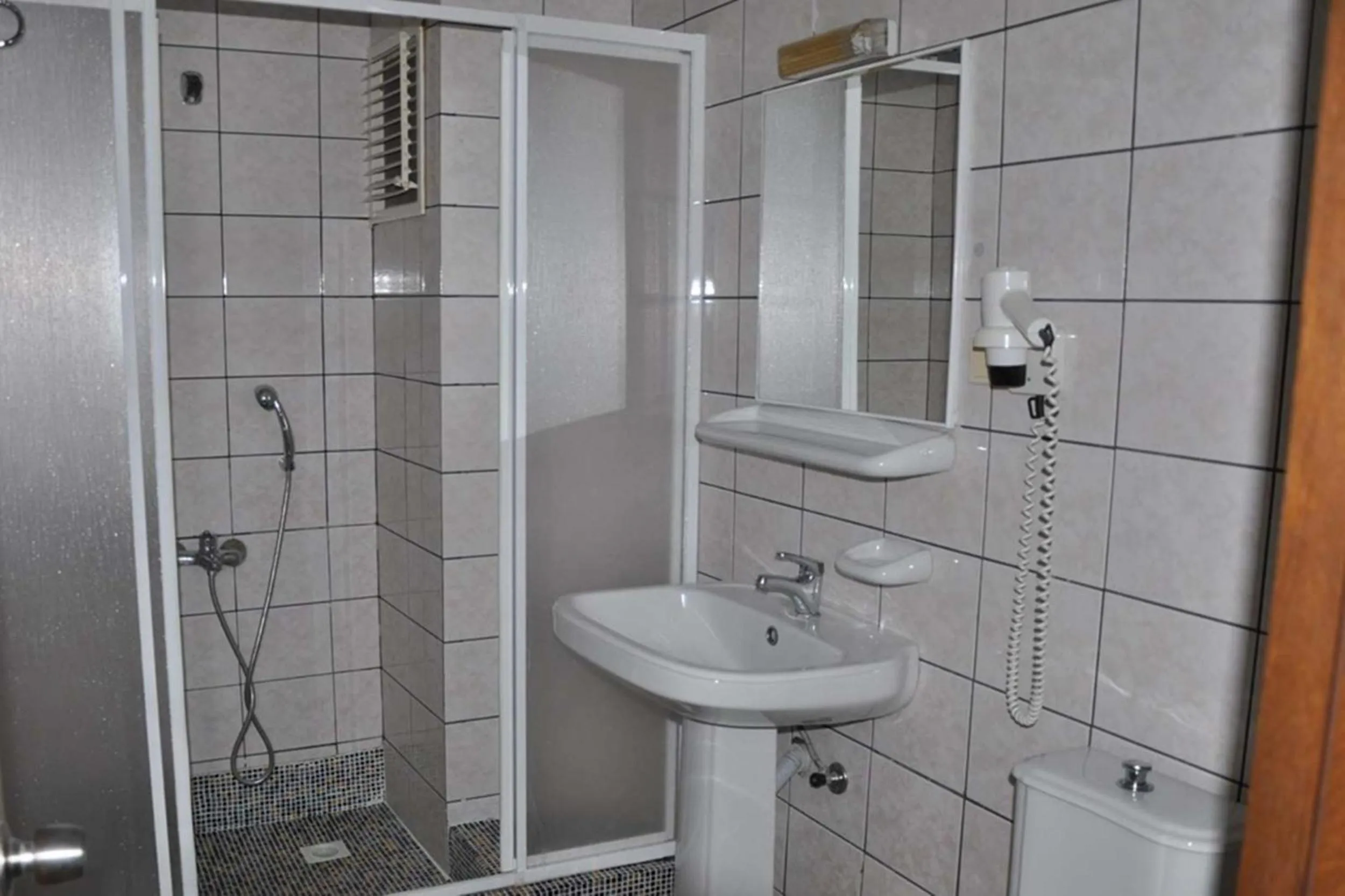 Bathroom in Carmen Suite Hotel