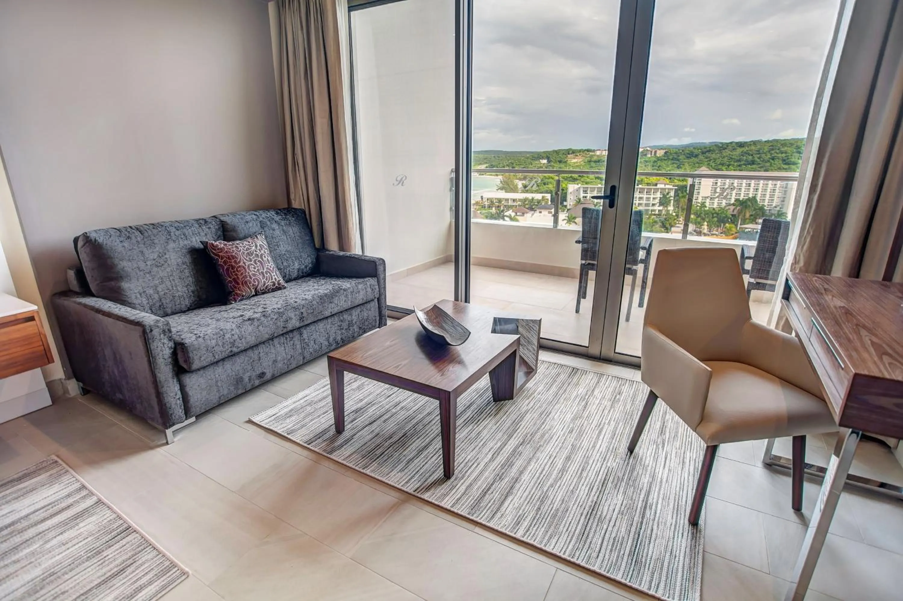 Living room in Royalton Blue Waters Montego Bay, An Autograph Collection All-Inclusive Resort