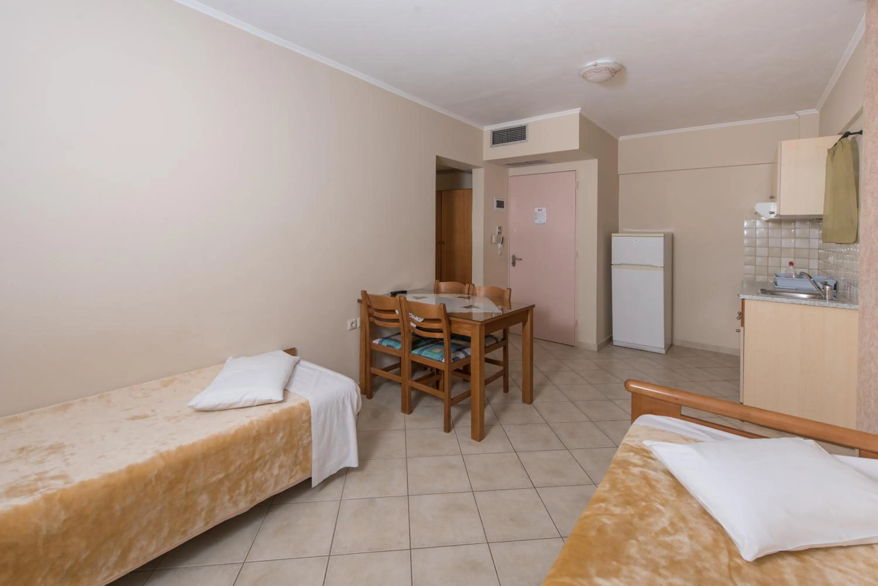 Bed in Sun Rise Hotel Apartments