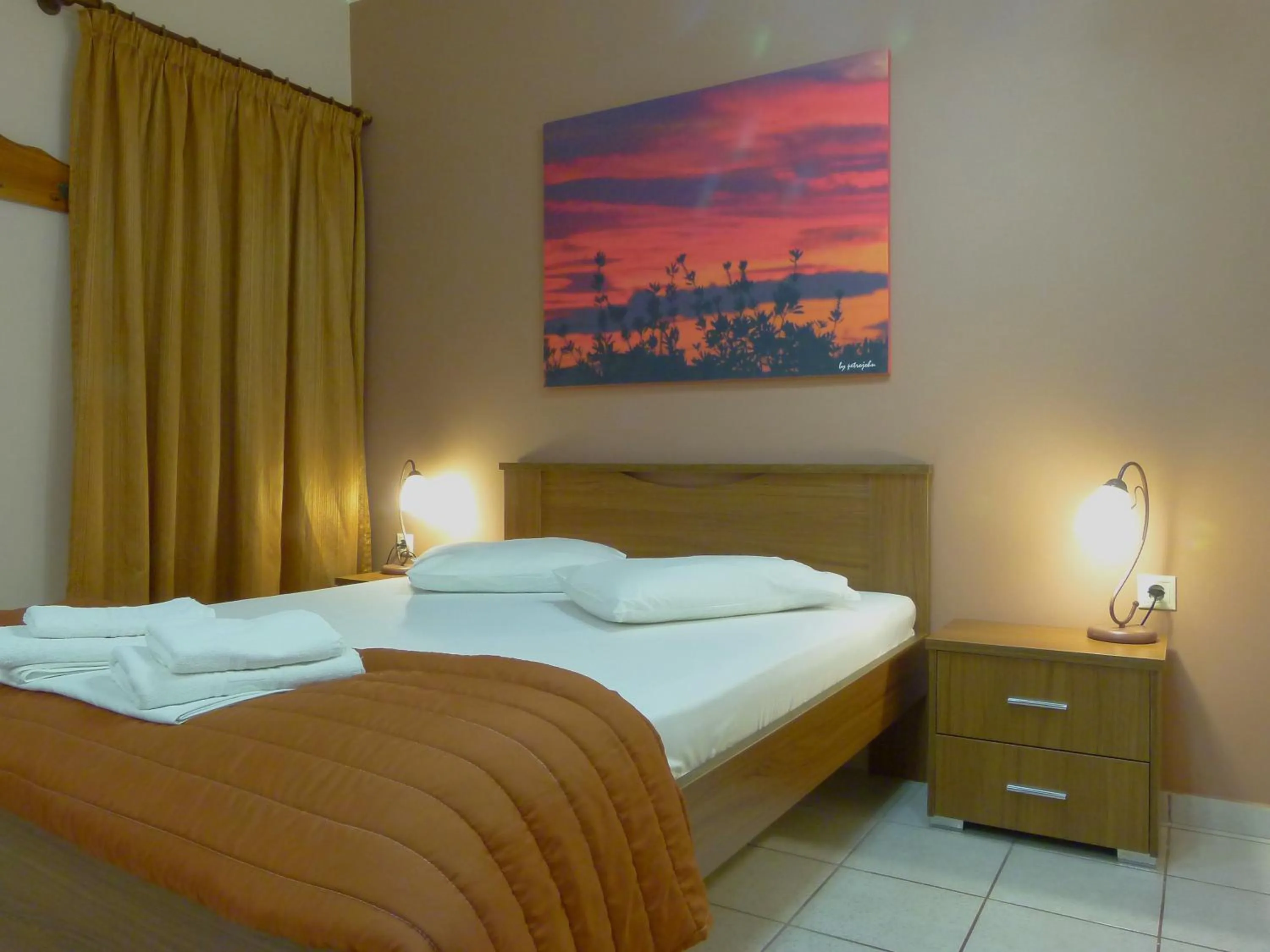 Bed in Sun Rise Hotel Apartments