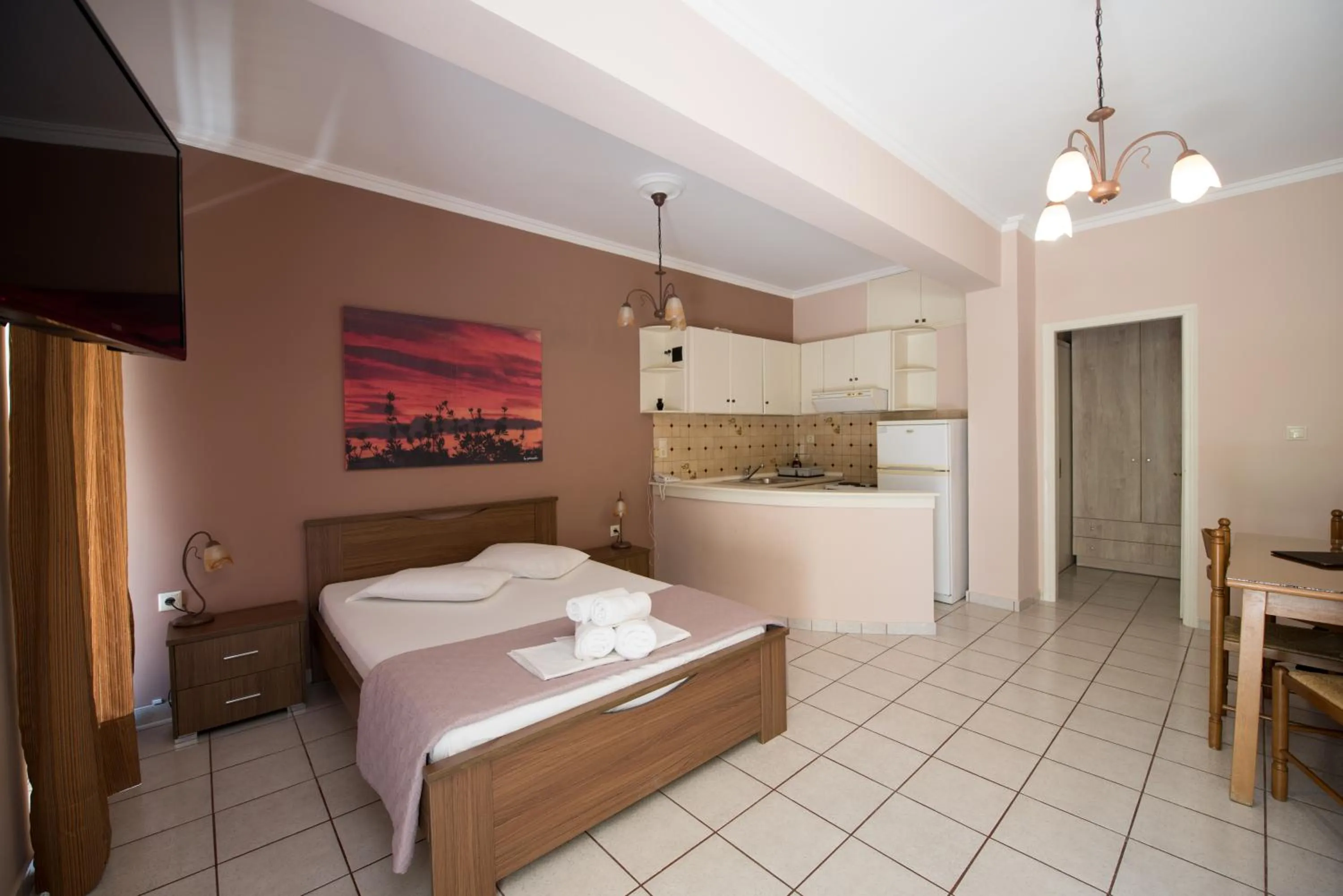 Bed in Sun Rise Hotel Apartments