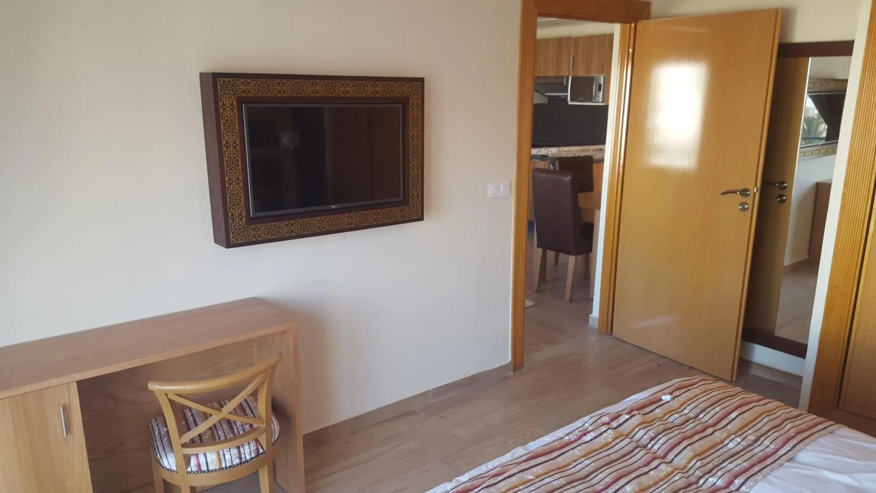 TV and multimedia, Bed in Rofaida Appart'Hotel