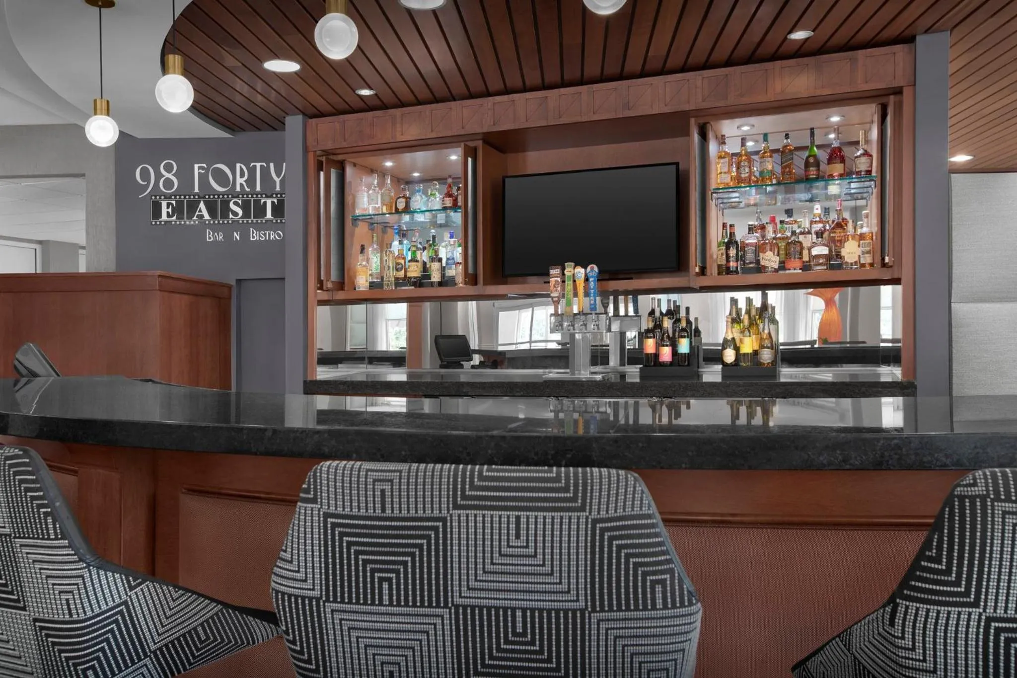 Lounge or bar in Hotel Indigo Jacksonville-Deerwood Park by IHG