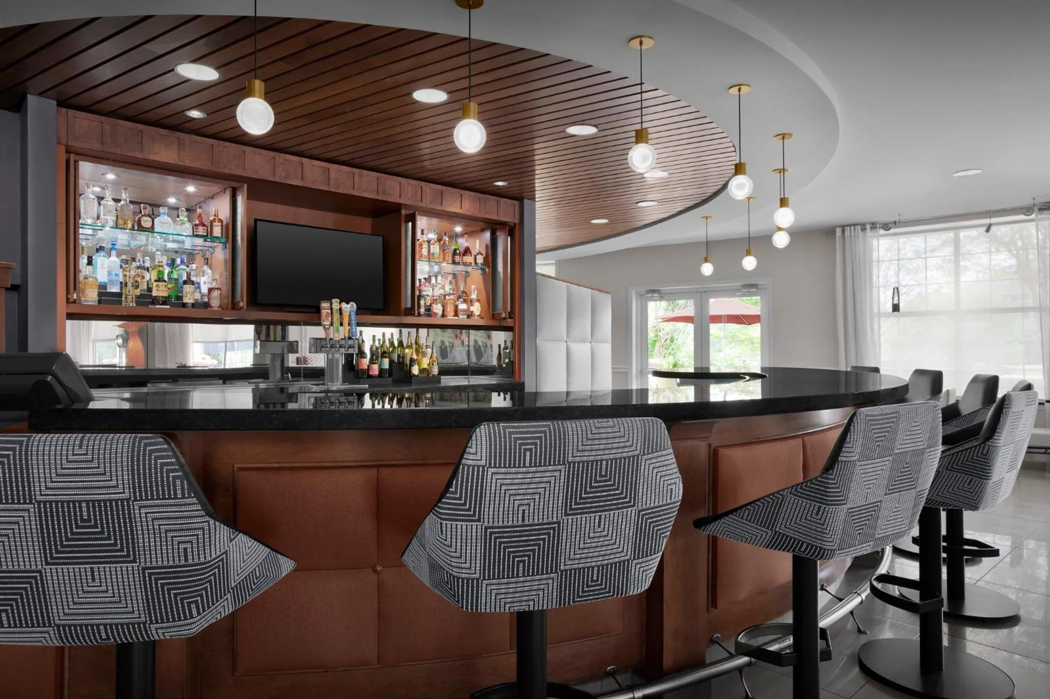 Lounge or bar in Hotel Indigo Jacksonville-Deerwood Park by IHG