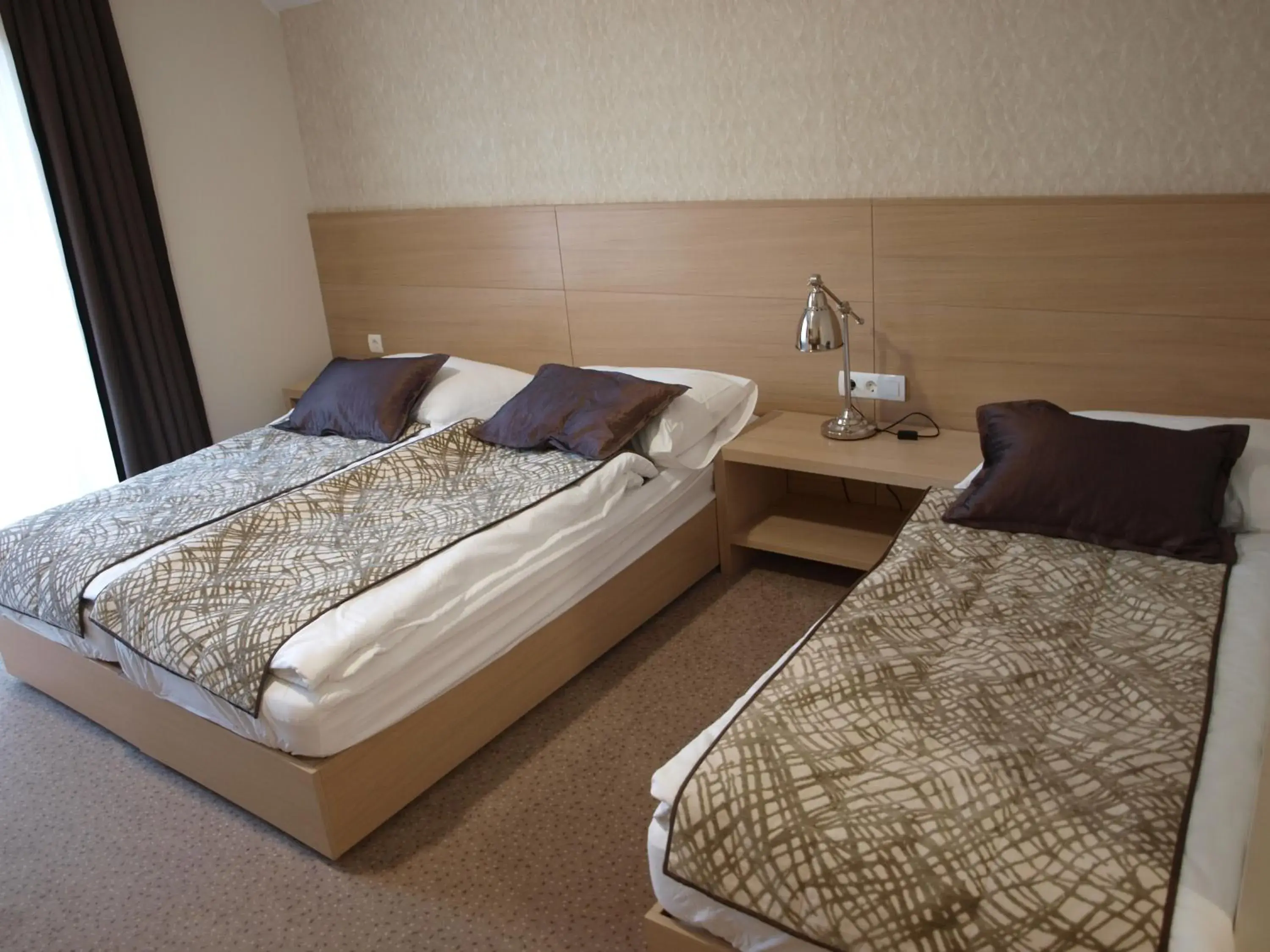 Triple Room with Balcony in Hotel Mangart Triple Room with Balcony in Hotel Mangart