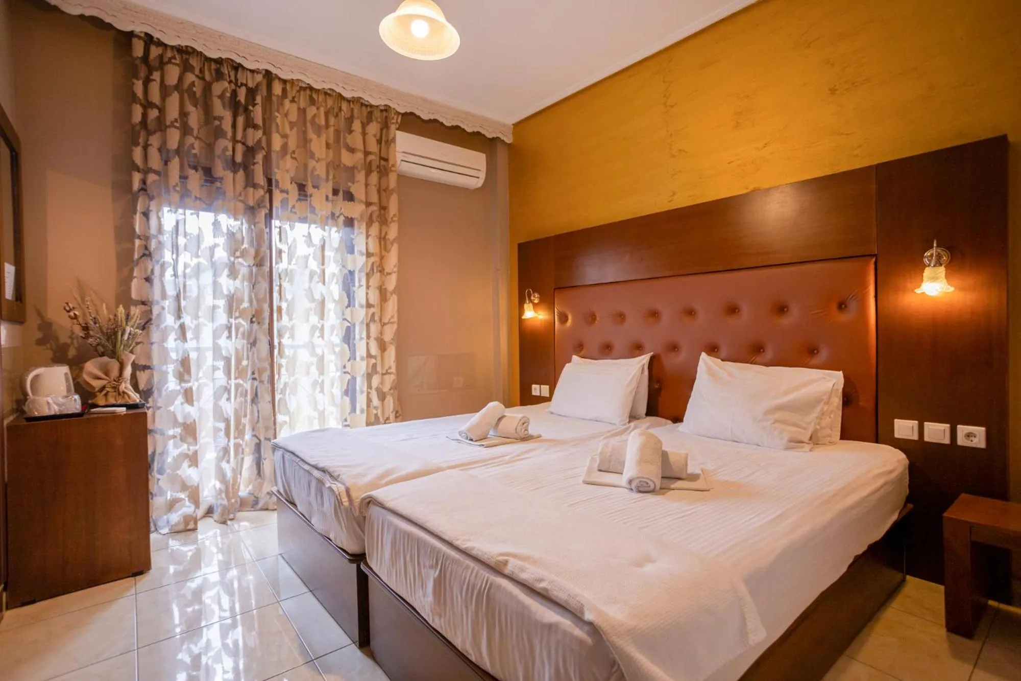 Bed in Toti Boutique Rooms