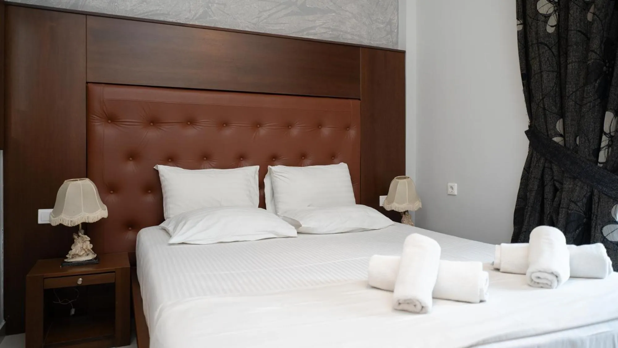 Bed in Toti Boutique Rooms