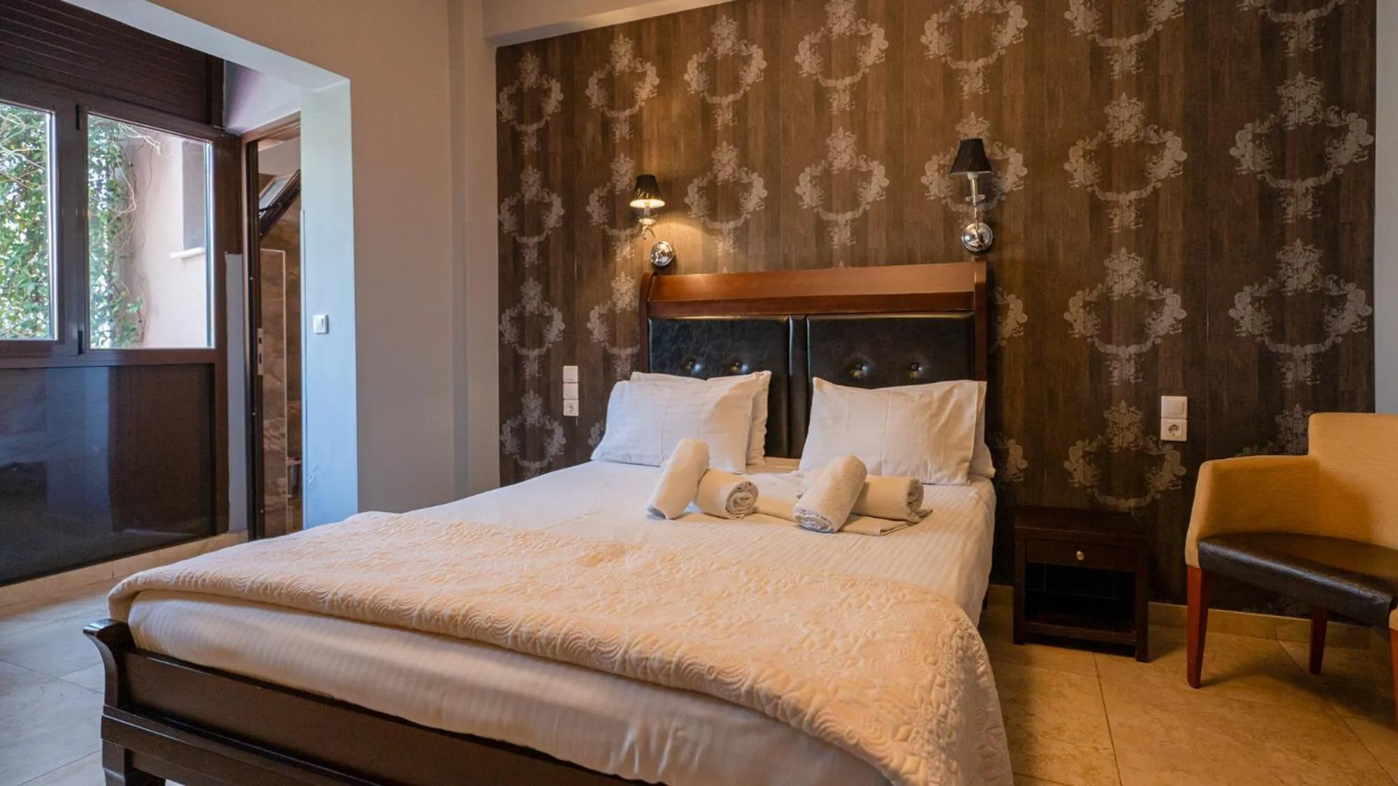 Bed in Toti Boutique Rooms