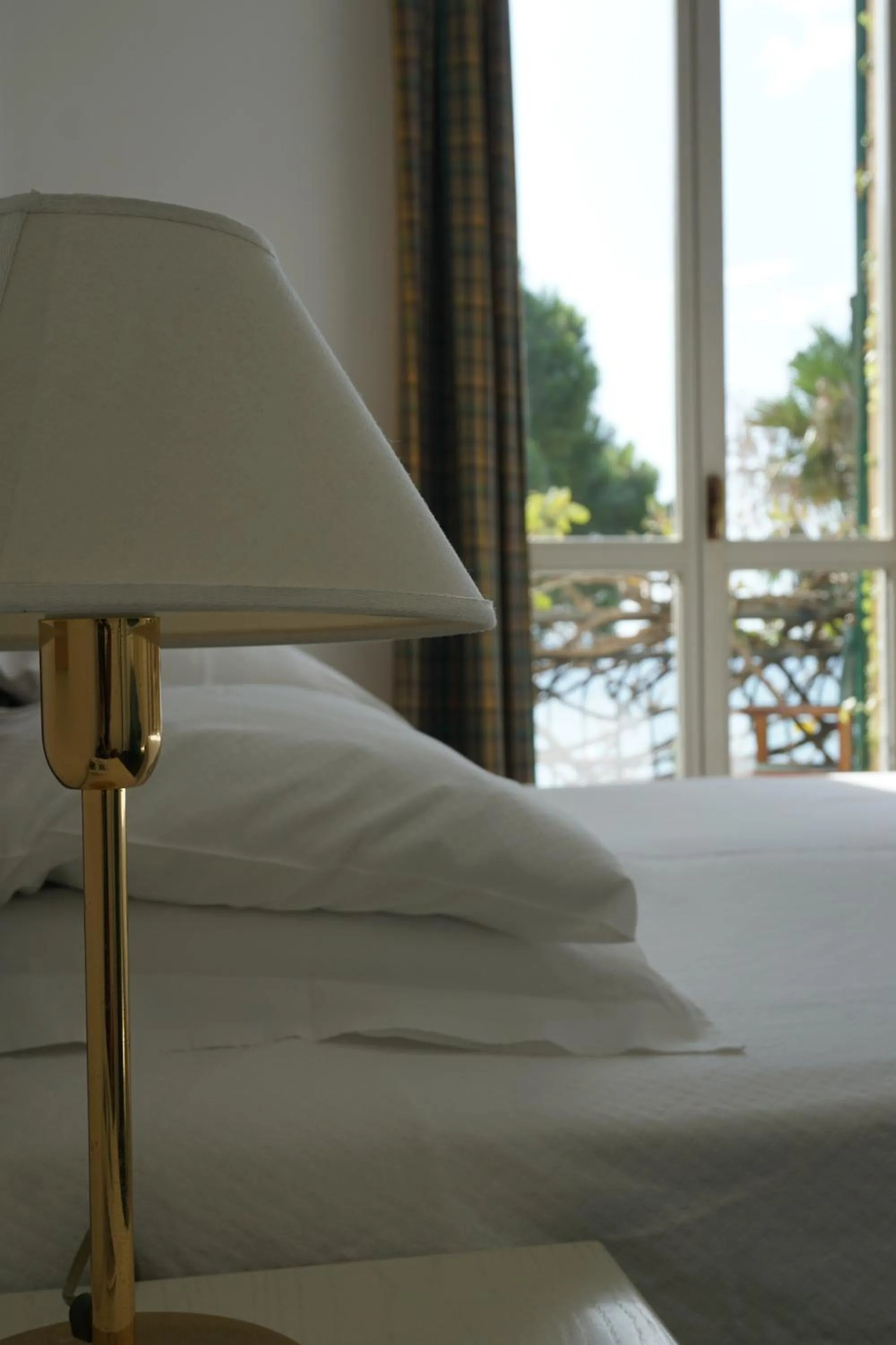 Bed in Hotel Beau Rivage