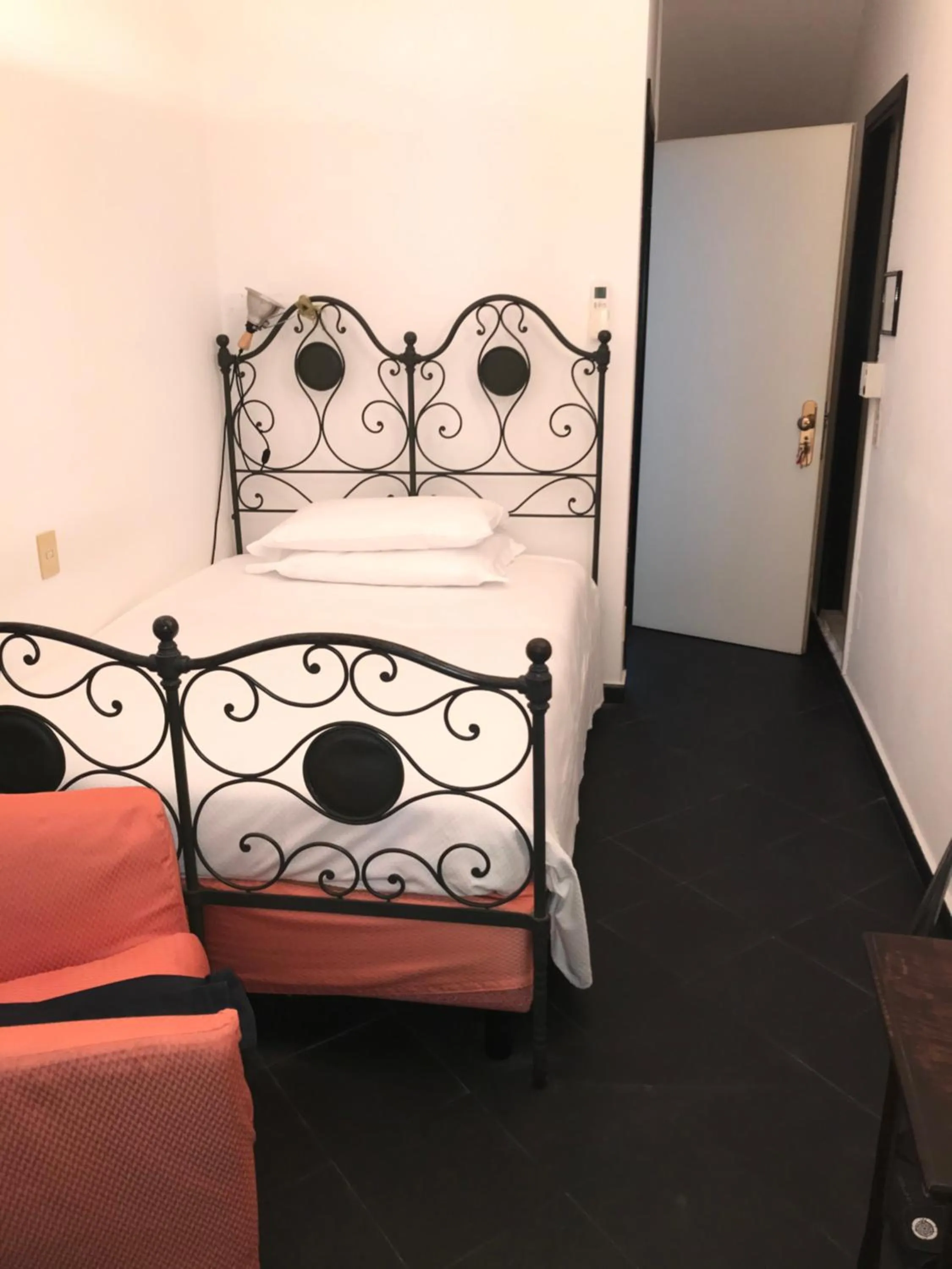 Bed in Hotel Beau Rivage