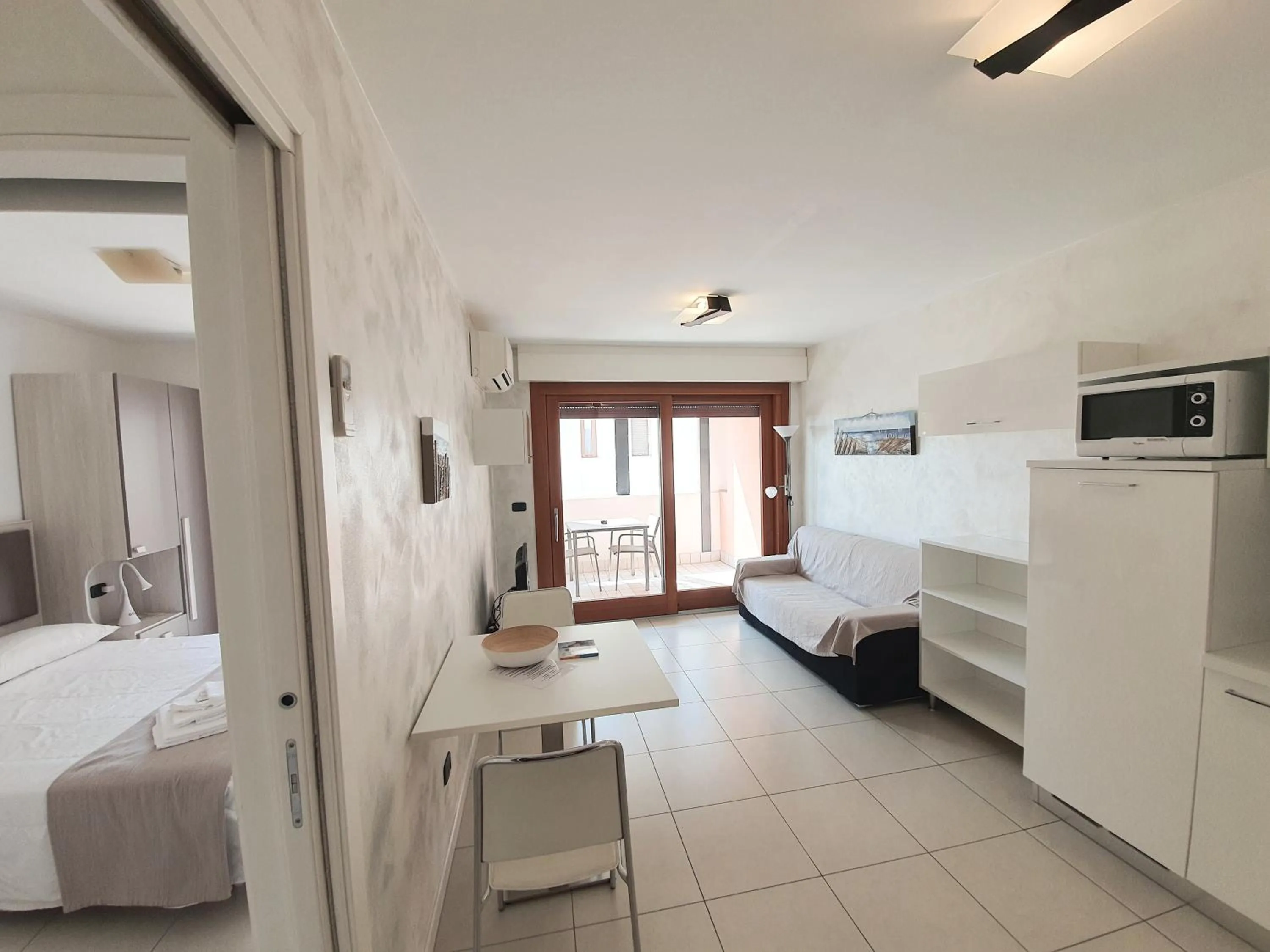 Living room, Bed in Aparthotel Capitol