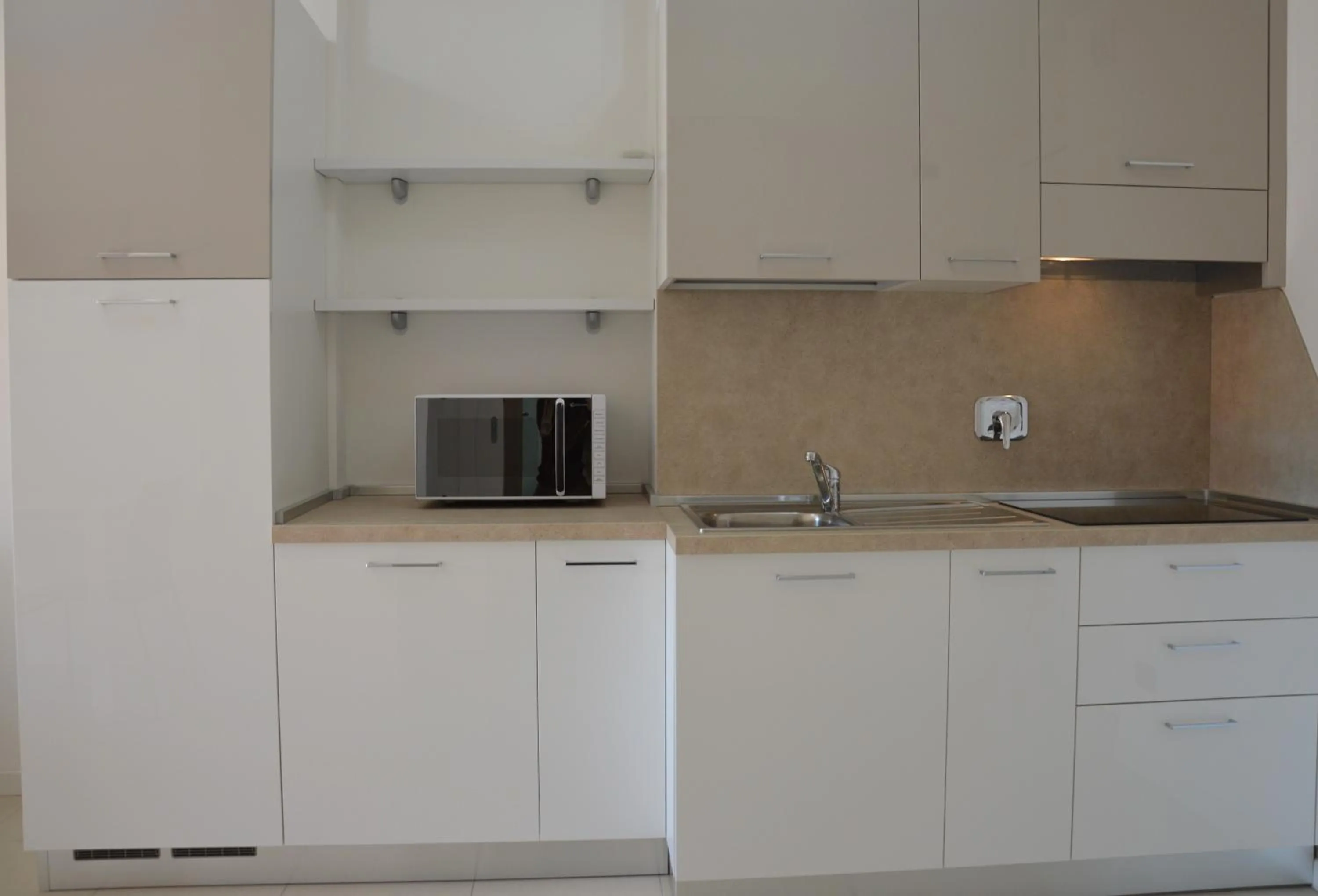 Kitchen or kitchenette in Aparthotel Capitol