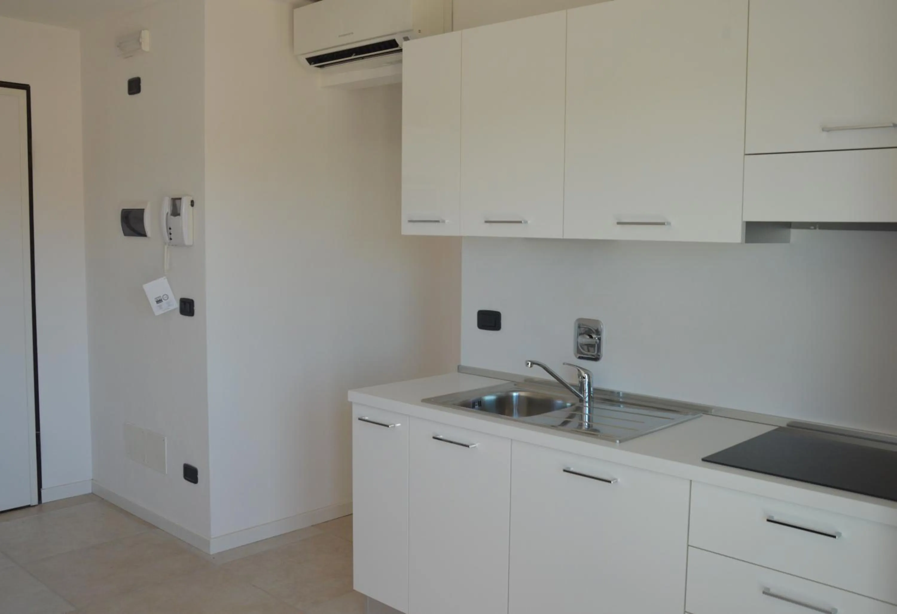 Kitchen or kitchenette in Aparthotel Capitol