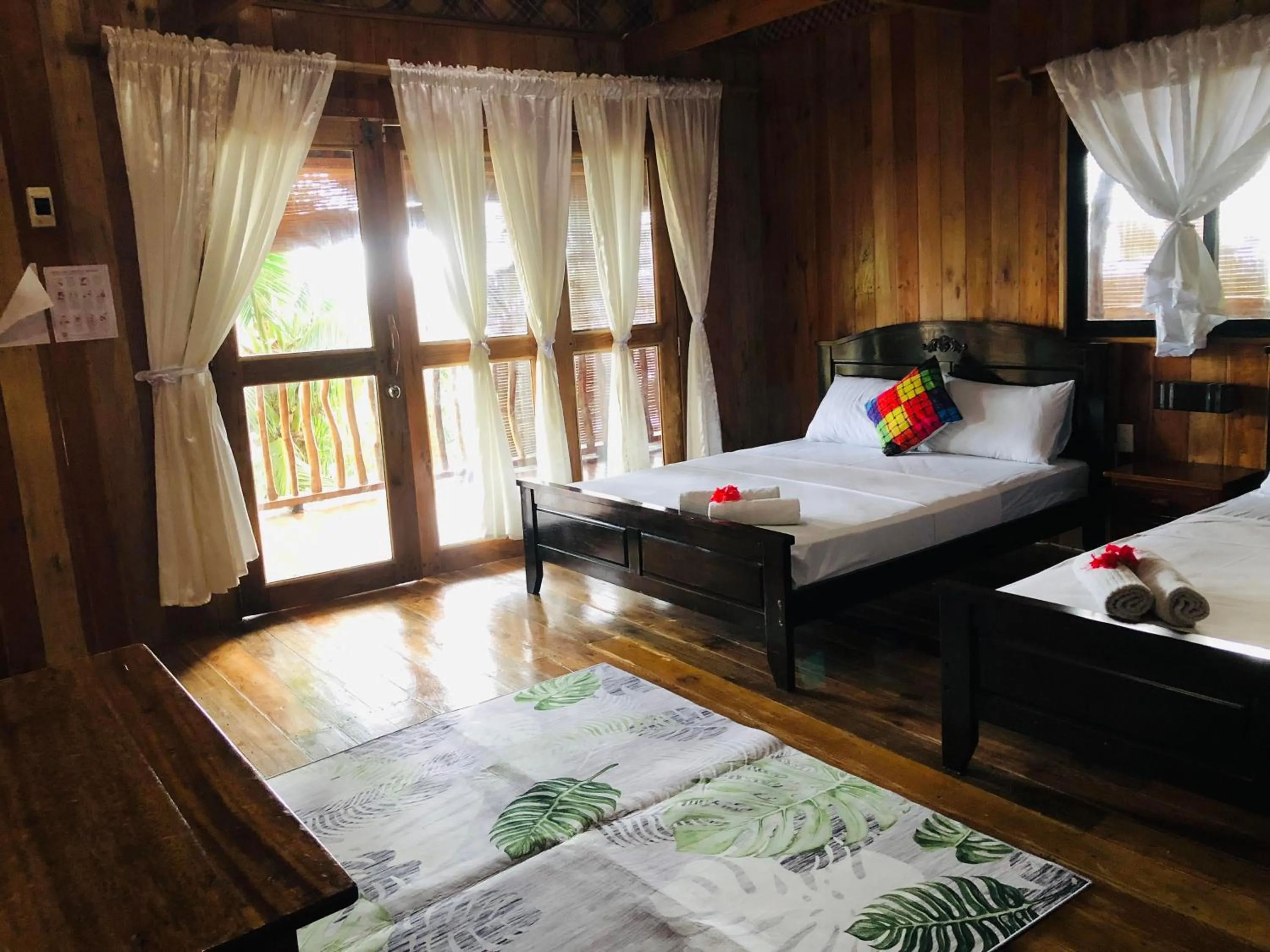 Bedroom, Bed in White Beach Front and Cottages