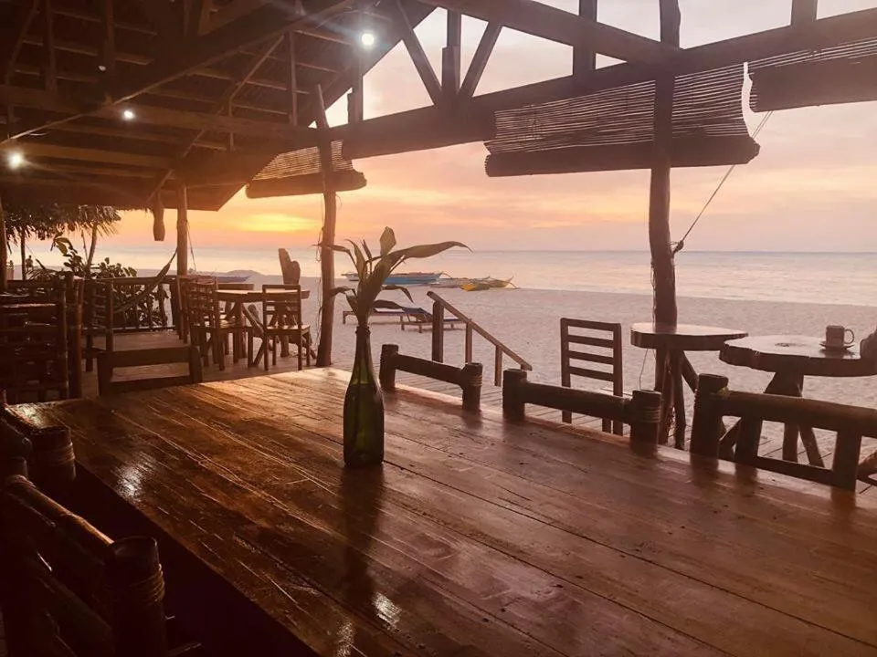 Dining area in White Beach Front and Cottages
