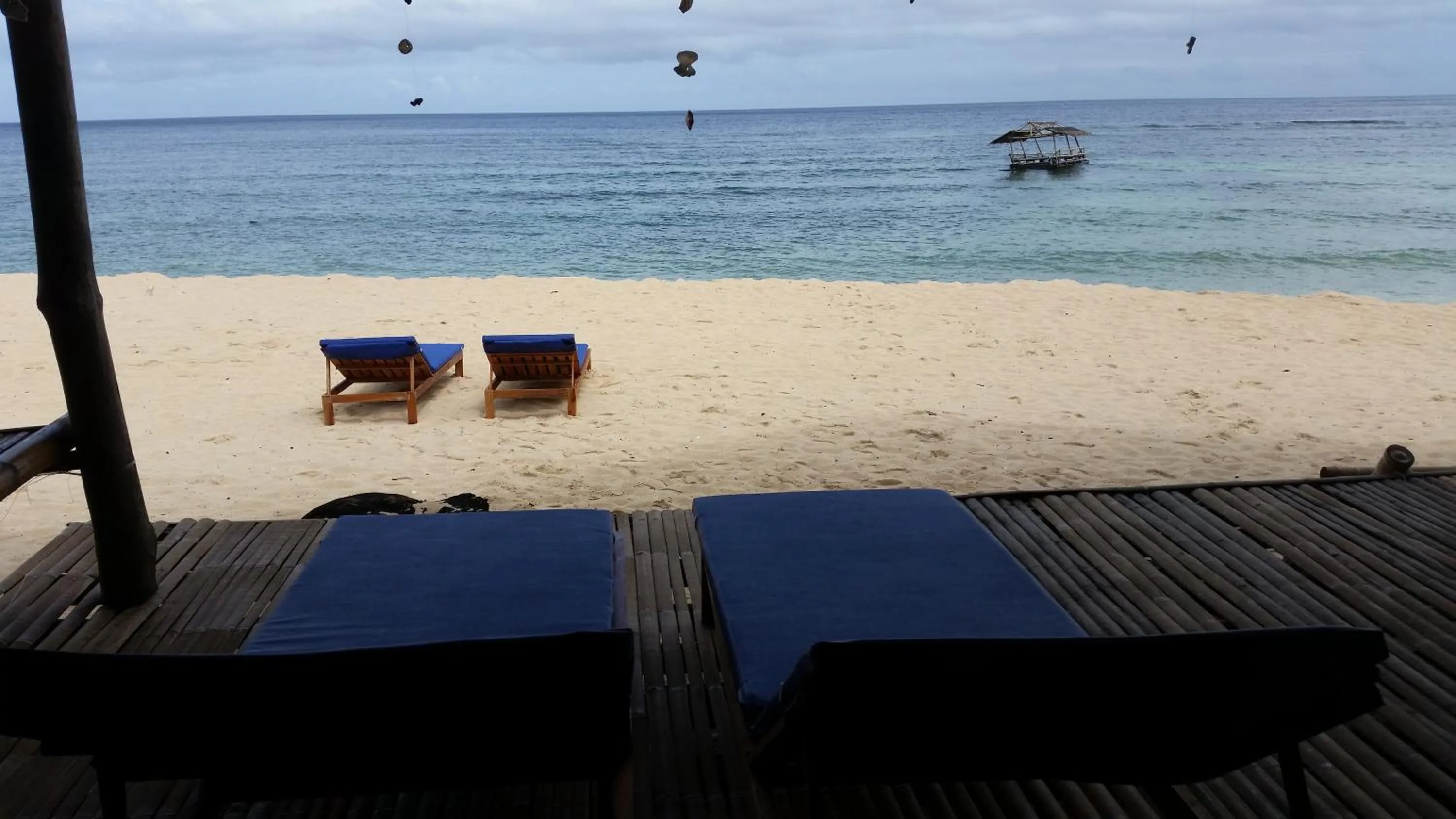 Seating area in White Beach Front and Cottages