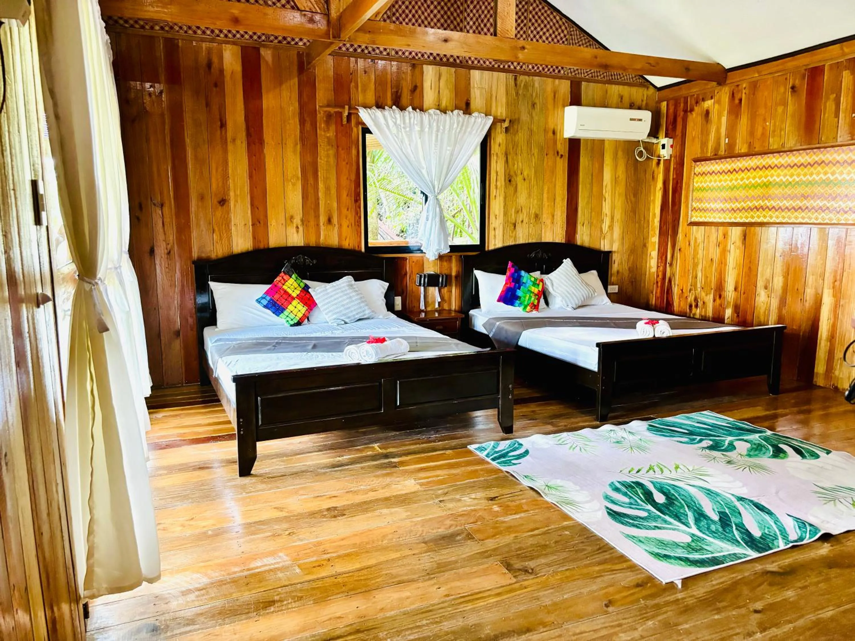 Bedroom, Bed in White Beach Front and Cottages